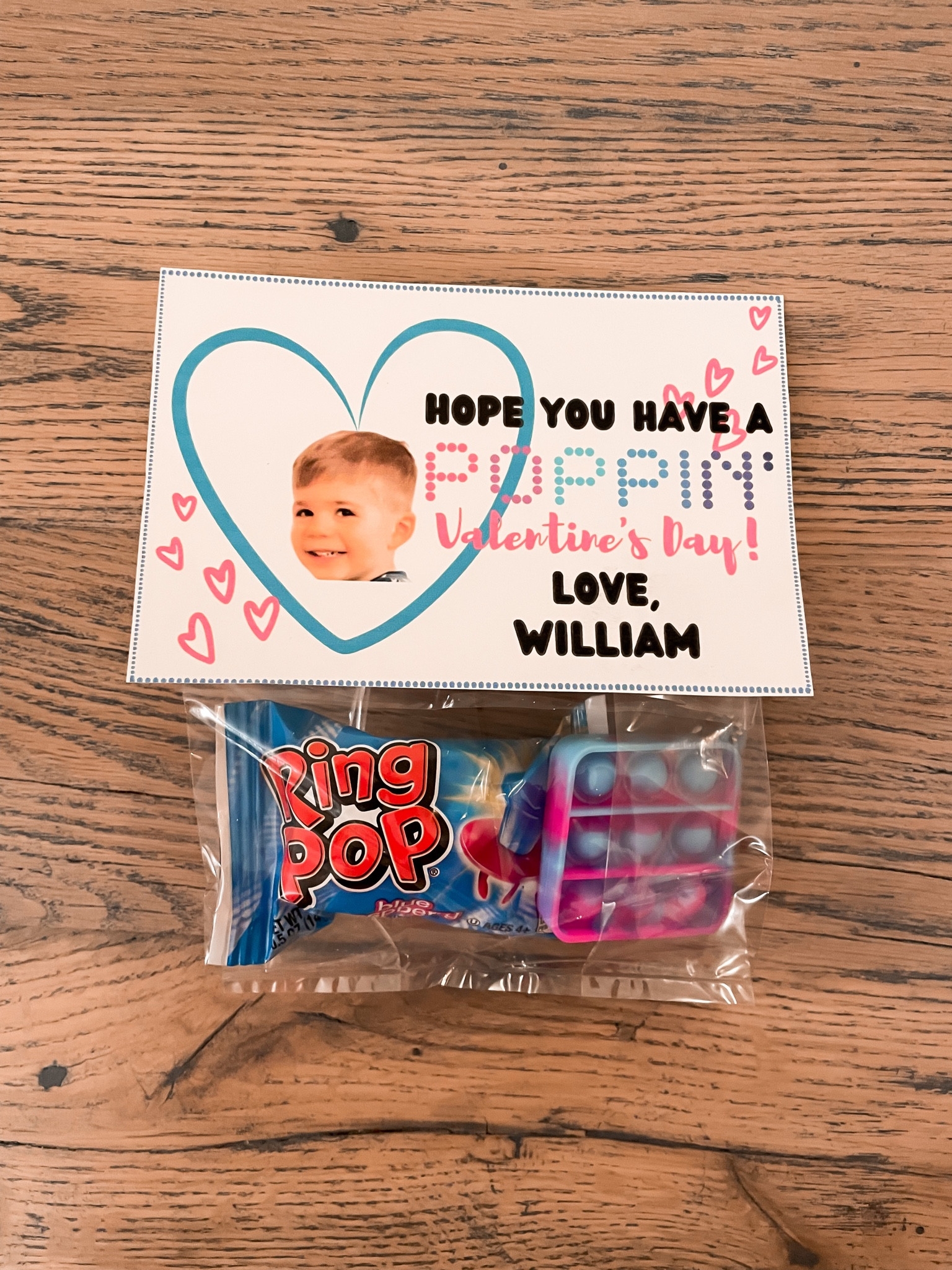 Valentine’s Day cards for kids 💕 I created the Valentine’s Day card using Canva, inspired by @heymadinelson🤍 I placed the Ring Pop & Pop-it inside the bag, folded the bag over & taped the card to the bag. 

#valentinesday #valentinesdaygifts #valentinesdaycards #classvalentinesgift #schoolvalentines 

#LTKGiftGuide #LTKfamily #LTKkids