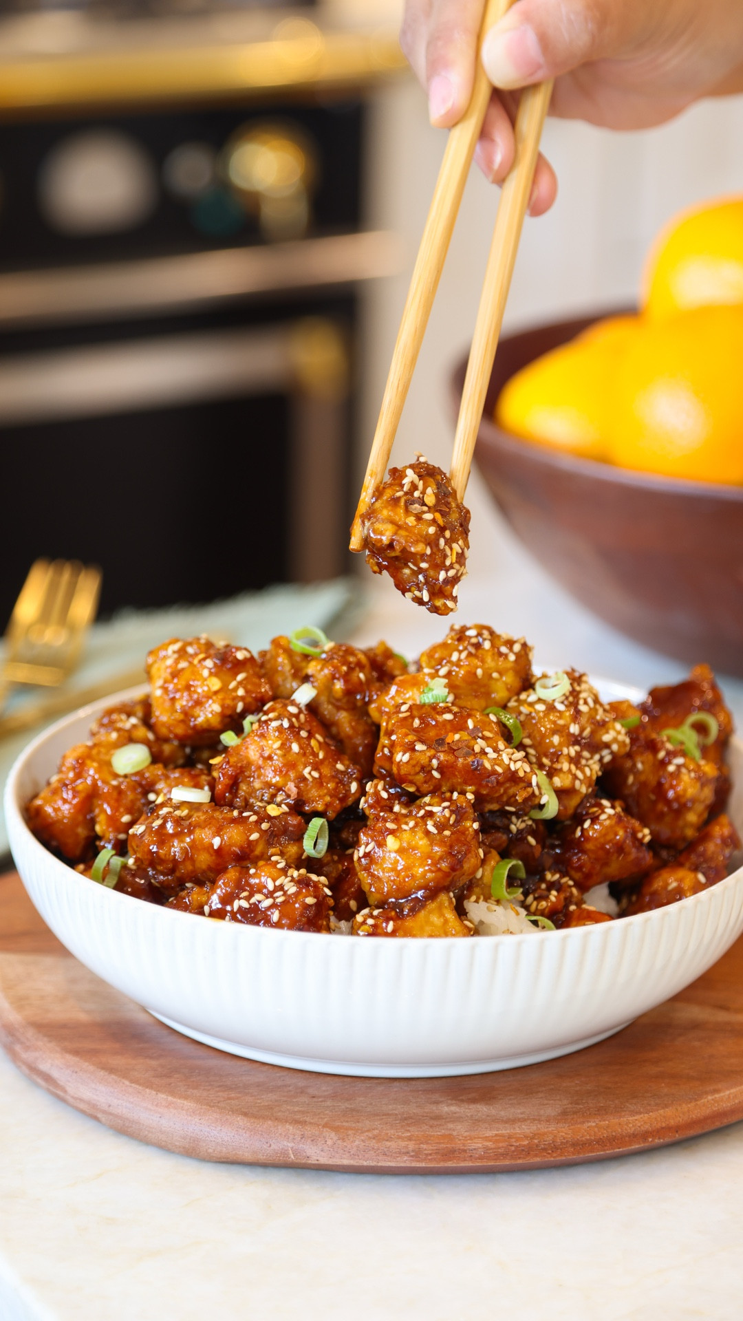 Homemade Orange Chicken with the tastiest sweet, spicy, & citrusy sauce! I love making takeout recipes right at home! #ChickenRecipes #DinnerIdeas 

#LTKHome