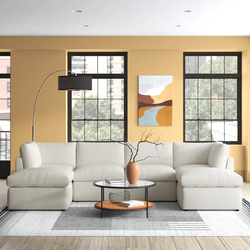 Annai 129" Wide Reversible Modular Corner Sectional with Ottoman | Wayfair North America