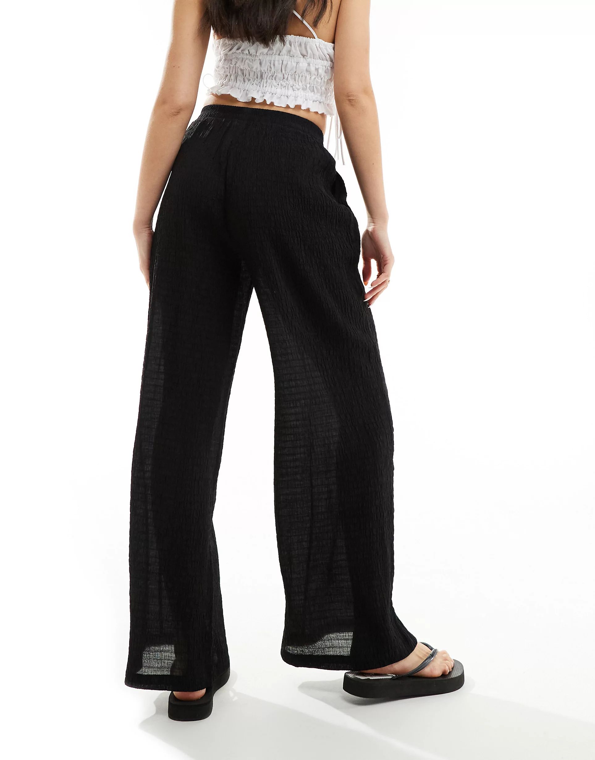 Bershka crinkle wide leg trousers in black | ASOS (Global)