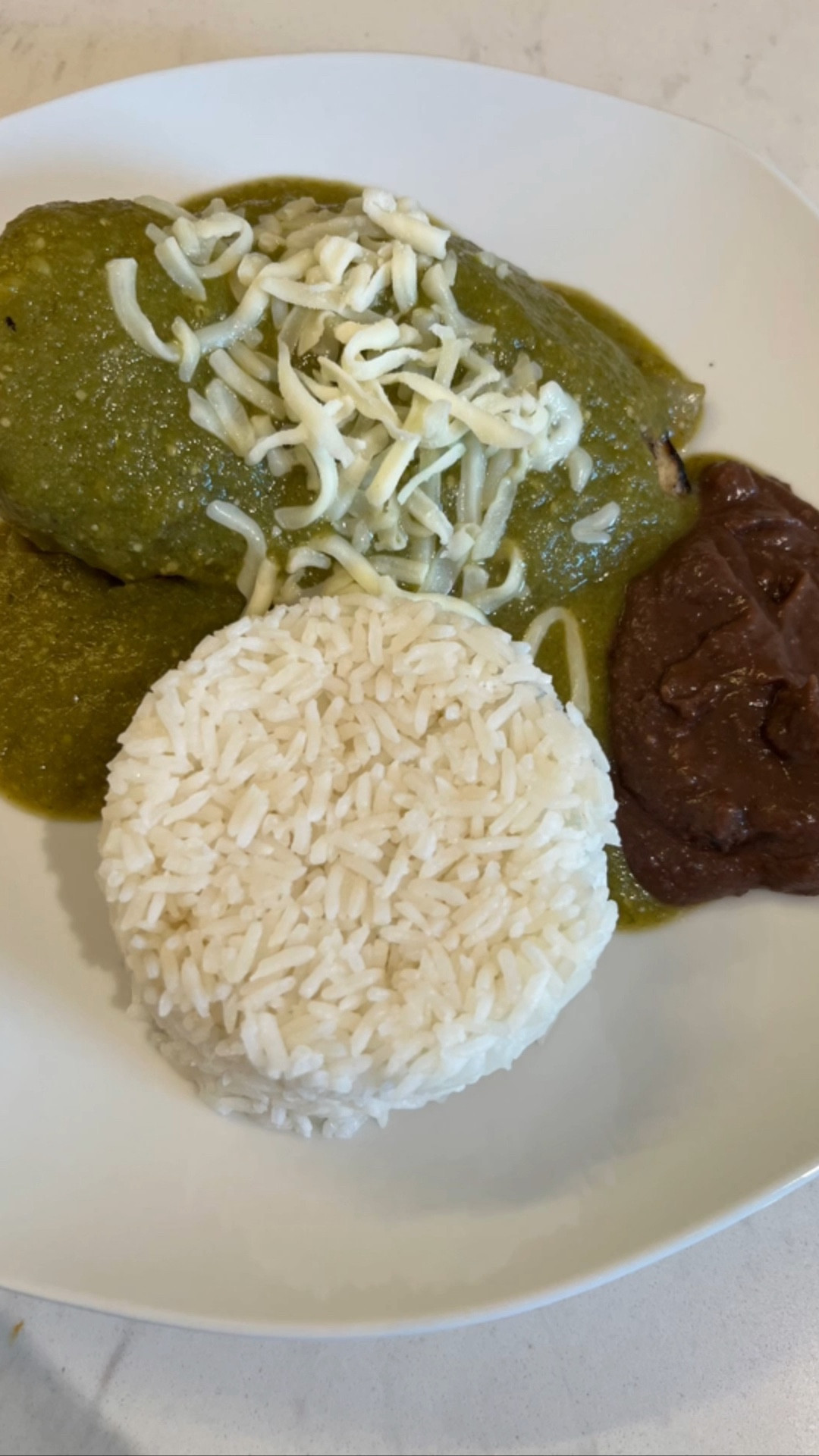 Poblano Sauce. 
• 1 poblano pepper Roast and clean
• 3 Serrano chiles 
• 12 tomatillos/ green tomatillos NO green tomatoes 
• 1 cup of cilantro
• 1/2 onion
• 3 garlic gloves 
• 2 zucchini’s 

Instructions 
• first clean everything then in a baking tray at 400 for 20 minutes roast the veggies.
• The poblano pepper clean it once is roasted put it in a ziplock bag so it’s easy to peel (seeds and skin)
• Everything goes in the blender. Add the clean cilantro then blend.
• In a pot get 1/4 of onion and fry until traslucid and add the  sauce. Let it cook for 5  min and it’s ready. add salt to taste.
• You can use for anything you like.
#adrismexicankitchen #recipeblog 


#LTKhome