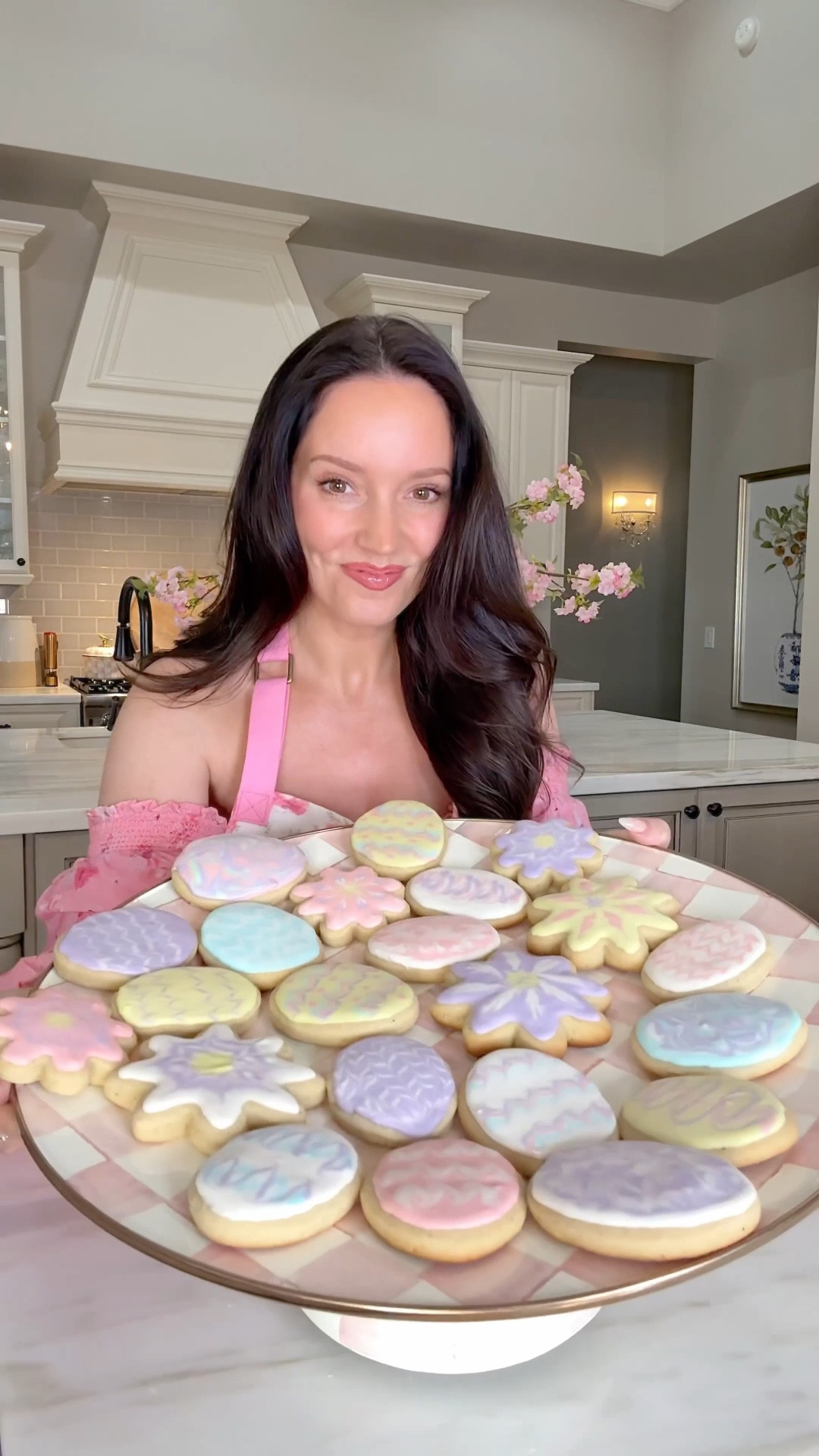 Soft, fluffy, and so easy to make! These are my grandma’s famous sugar cookies and these little tips make them turn out perfect every time! Think soft, almost cake like cookies with the prettiest royal icing. Perfect for Easter!

And if you love a pretty kitchen moment as much as I do, all the utensils I used are @mackenziechilds Rosy Check! 

ICING RECIPE:

Beat:
3 TBSP Meringue Powder
1/2 + cup Warm Water (Until frothy)

Add:
4 Cups Powdered Sugar
(Slowly until glossy)

Add:
Vanilla to taste and more water if the icing is too stiff. This dries pretty fast (within 5-10 minutes)

GRANDMA’S SOFT SUGAR COOKIE RECIPE:

1 Cup Soft Butter
11/2 Cups Sugar
2 Eggs
1 Cup Sour Cream
11/2 TSP Vanilla
41/2 Cups Flour
1 TSP Salt
1 TSP Baking Soda
1/2 TSP Nutmeg

Cream butter and sugar till fluffy, add eggs and beat well.
Add sour cream and vanilla, blend well. Add dry ingredients. The dough will get quite soft. Chill for several hours or over night is best. Roll to 1/4 inch thickness, cut, (sprinkle with sugar if you don’t plan to frost), and bake at 375 for 8-12 minutes just until some edges get barely golden). Undercooked is better than overcooked. 

#LTKmomlife #LTKfoodie #LTKHome