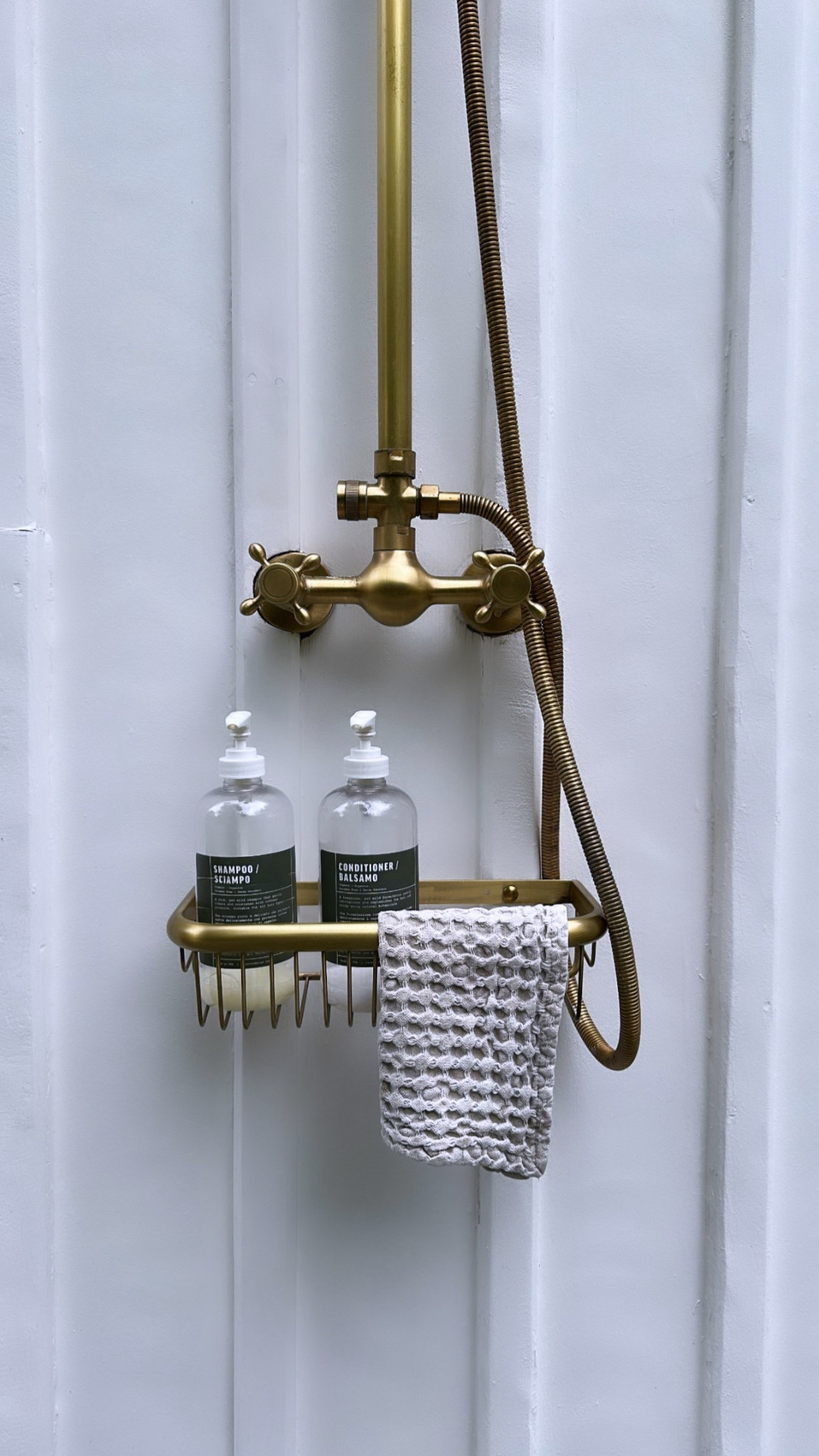added this brass shower basket to our outdoor shower wall to corral the shampoo, conditioner, and soap. under $30, looks cute! 

#LTKFindsUnder50 #LTKSeasonal
