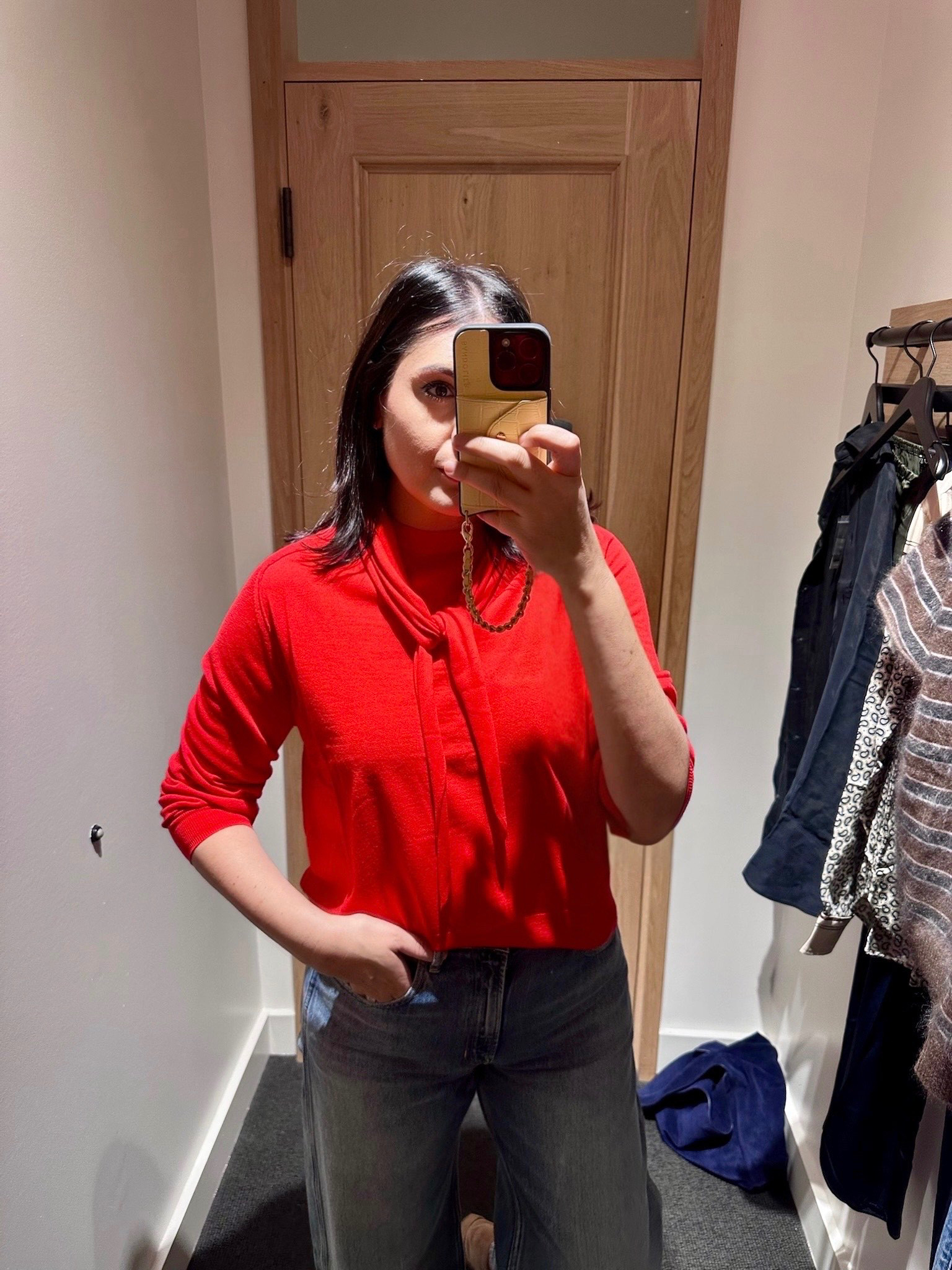 I am in the large of the sweater and it fits me perfectly! It's a bit more relaxed in this size but I prefer that. The scarf is sewn onto the back of the neckline and you can pull it around as a scarf in front.  I think I'd prefer the navy -- I've linked it as well! On sale!  

 