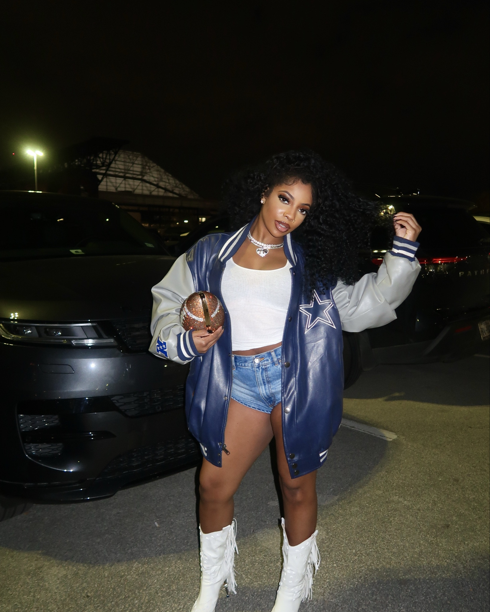 Not your average game day fit 💅🏽✨ 

Pulled up in fringe boots, denim shorts, and a vintage varsity jacket with a lil sparkle in my hand (literally). Whether you're in the suite or the stands, it's giving football but make it fashion.🏈✨

#LTKStyle #GameDayGlam #FringeBoots #FootballFashion #StyledByMe


#LTKPetite #LTKStyleTip #LTKOver40