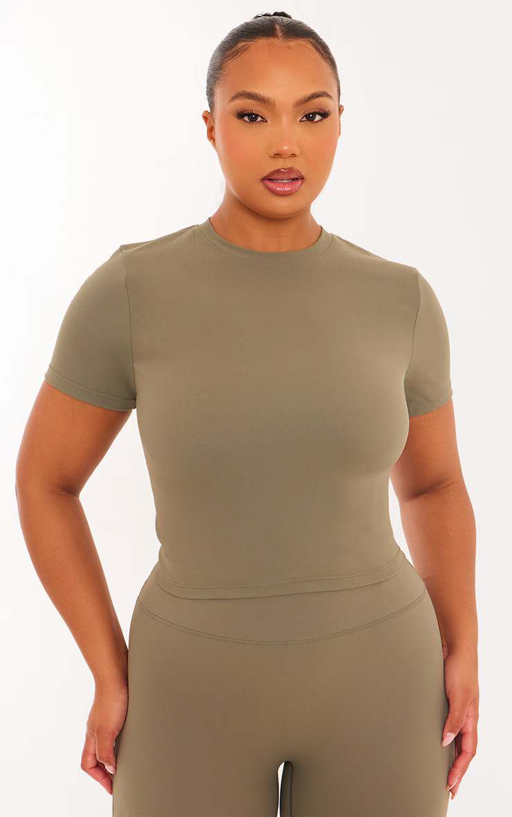 Plus Olive Sculpt Longline Short Sleeve Gym Top | PrettyLittleThing US