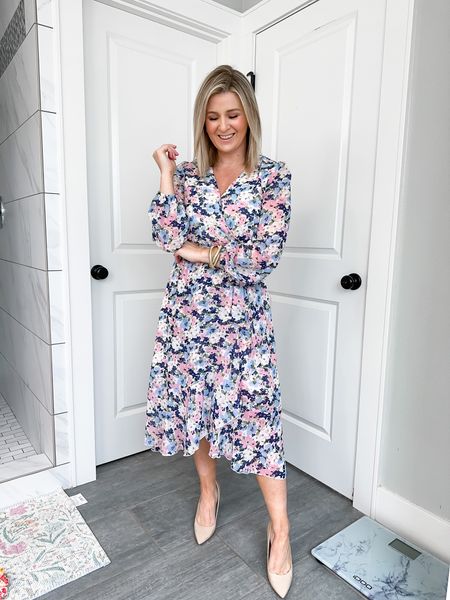Loving this spring dress. Great for Easter or any function you have coming up but could be great for the office too. It has a clasp at the bust to keep it shut, it’s a faux wrap and lined. Runs TTS 

#LTKstyletip #LTKSeasonal #LTKunder50