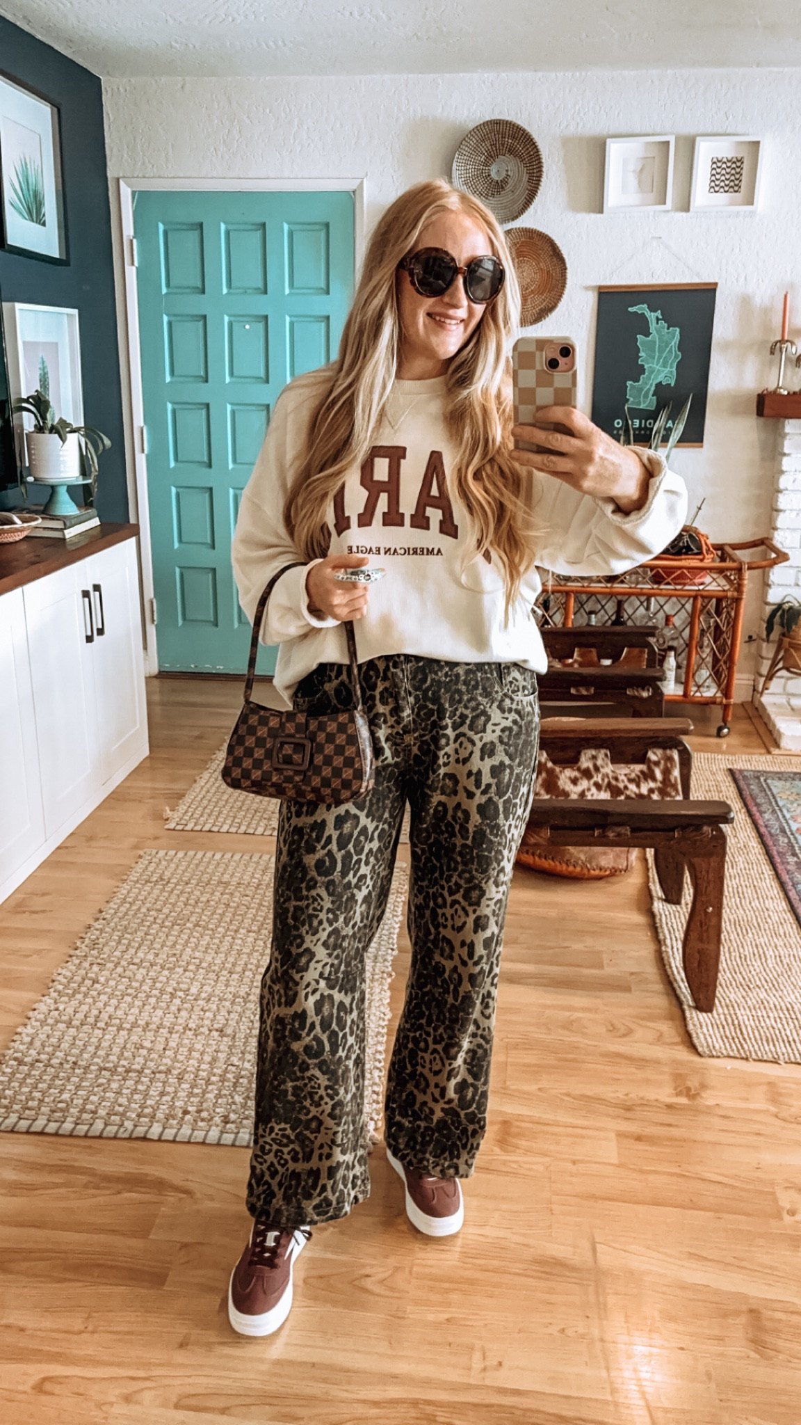 Leopard pants, Paris sweatshirt and wine sneakers look today ✨ 

Wearing L in sweatshirt and pants, at 150 lbs and 5’7” for reference. Shoes fit TTS! 

Fall outfit inspo, fall outfits, graphic sweatshirt, leopard pants, leopard jeans, burgundy sneakers, checkered bag, casual look, elevated casual, leopard print, Amazon fall funds, fall style, fall must haves, sneaker outfit, ae finds 

#LTKStyleTip #LTKFindsUnder100 #LTKSeasonal
