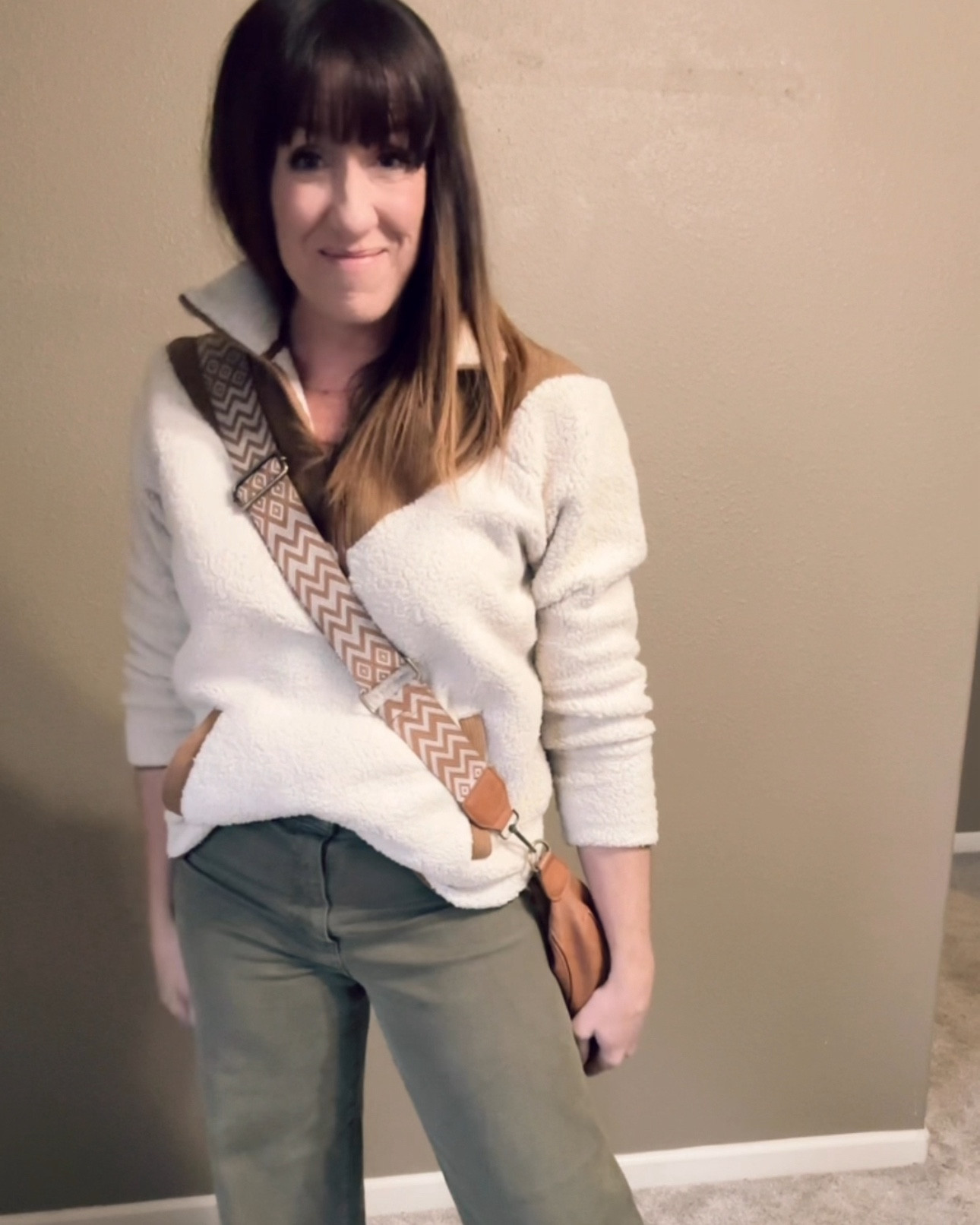 WALMART SHERPA PULLOVER FOR $20 - This adorable Sherpa pullover is only $20 at Walmart. Fuzzy and warm, with cute cordoroy details like the 3/4 zip and of course POCKETS. Great bum coverage and love it with the soft tuck too. 

Comes in sizes XS-XXXL. I sized up one size to a large for sleeve size and oversize fit.  Rock it casually with these tall socks and sneakers or dress it up with my favorite high waisted pants, chunky boots, and my go-to bag. 

#LTKOver40 #LTKFindsUnder50