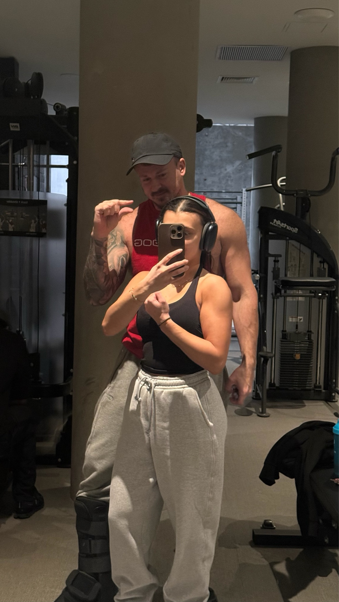 Gym date energy 🖤 comfy sweats, black tank, headphones on, locked in. #LTKActive #CouplesWorkout #AthleisureStyle #Gymshark

#LTKActive #LTKgrwm #LTKfitnessgoals