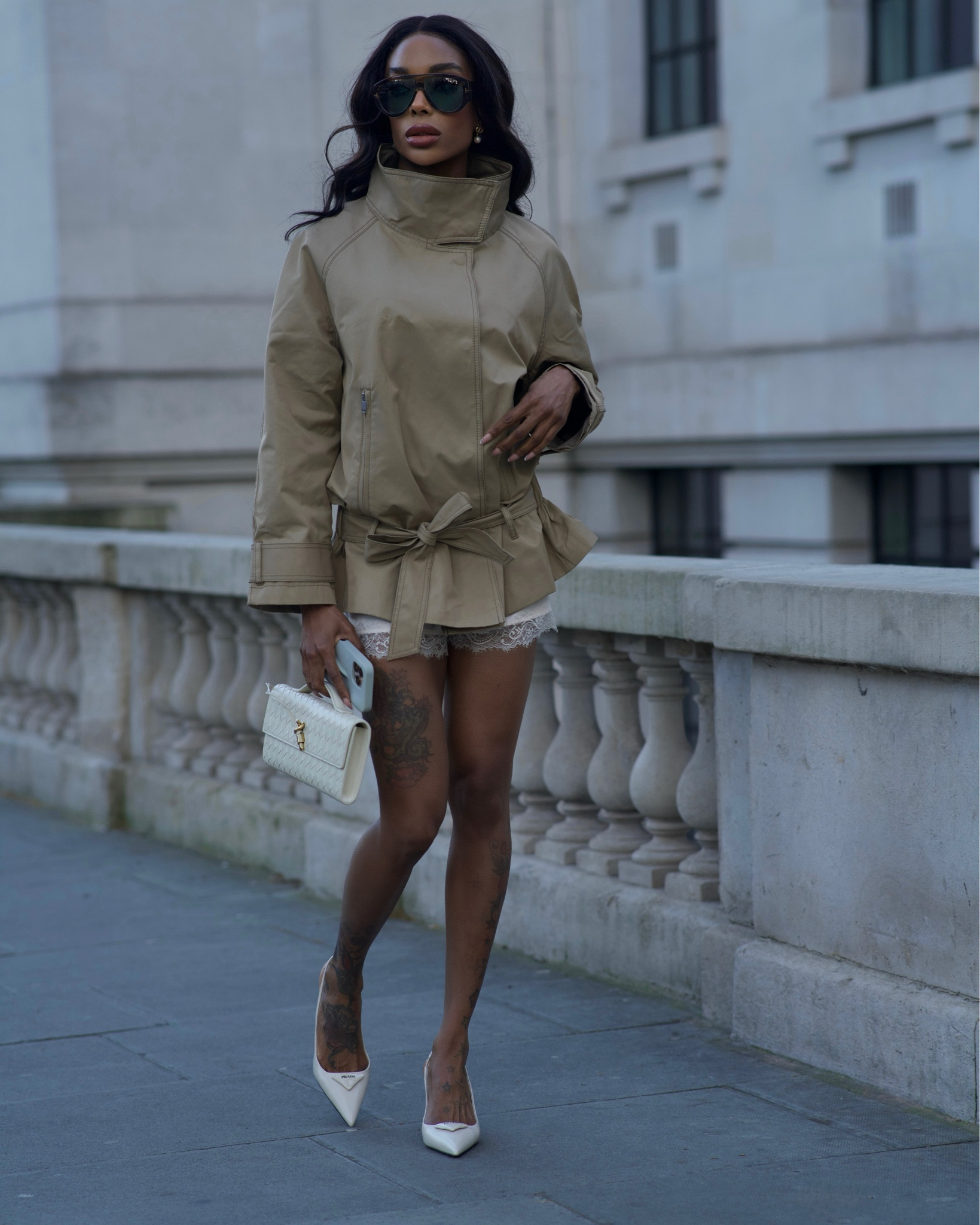 Lace shorts. Satin shorts. Trench coat. Stone coat. Prada heels. Bottega Veneta Clutch. Tom ford sunglasses

#LTKstyletip #LTKluxury #LTKspring