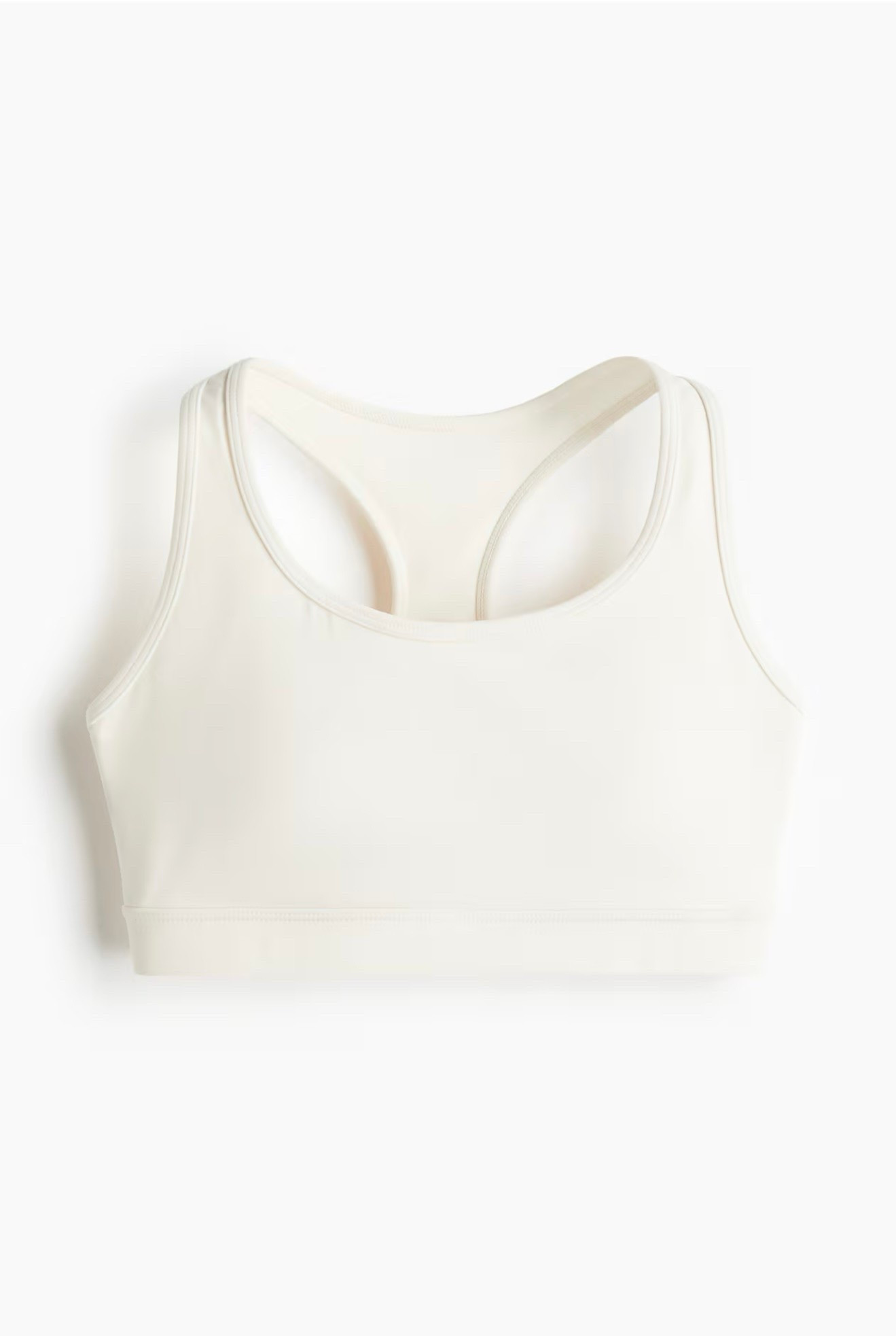 Racerback sports bra in functional fabric made with SoftMove for the ultimate in softness and comfort plus contouring support, and DryMove to wick away moisture from skin. Wide shoulder straps, round neckline, and lined cups with removable inserts for shaping and adjustable fit. Covered elastic at lower edge. Medium support, suitable for moderate-intensity workouts.

#LTKfitness #LTKsummer #LTKcanada