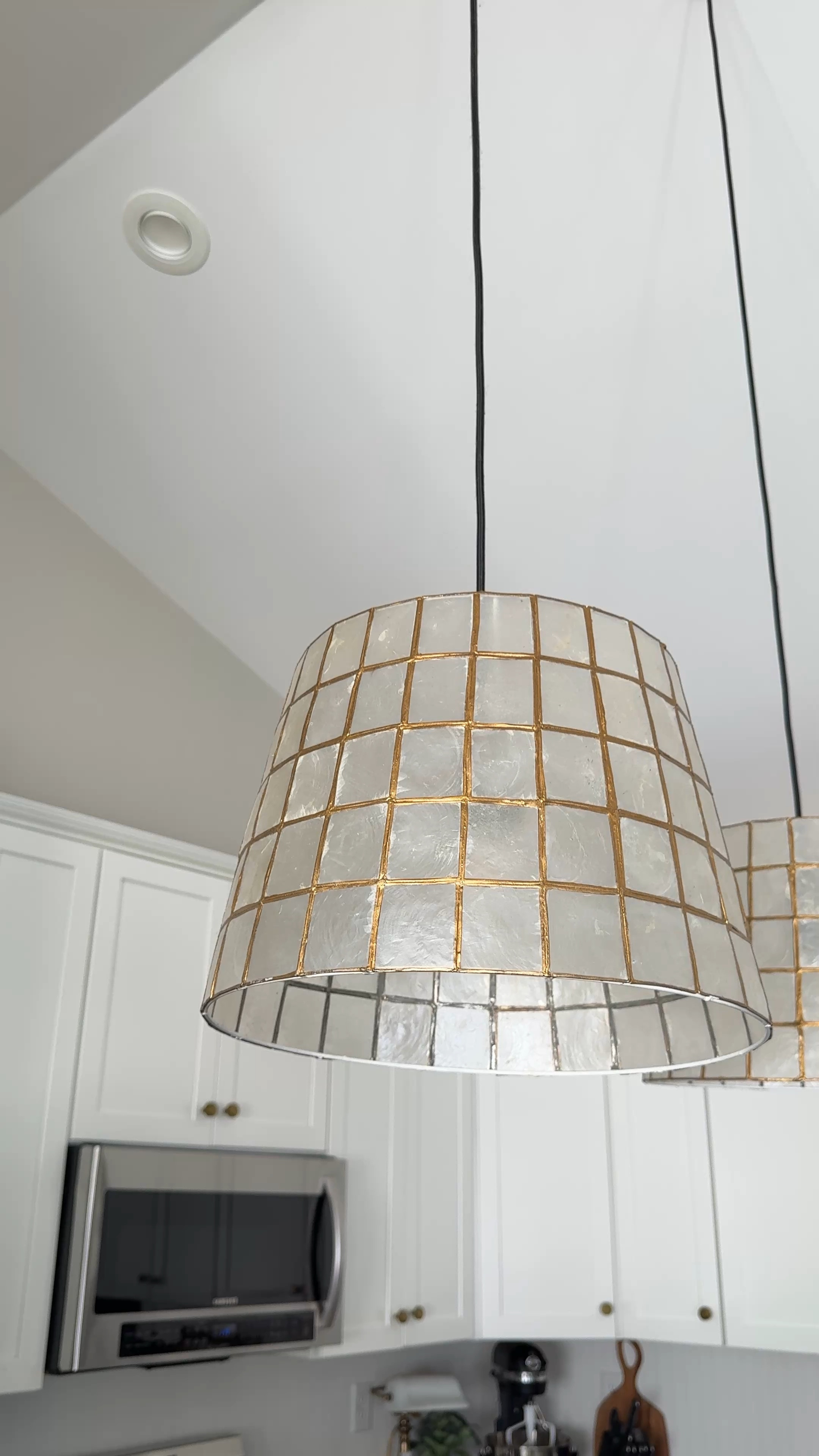Our lampshades that we replaced our pendant light covers with are back in stock! (If you missed it, we simply removed our builder-grade pendant light shades & popped on some affordable lampshades instead! Looks custom & was super affordable!)

Linked our exact ones below & some other similar Capiz Shell light fixtures.


#LTKHome #LTKFindsUnder100 #LTKFindsUnder50