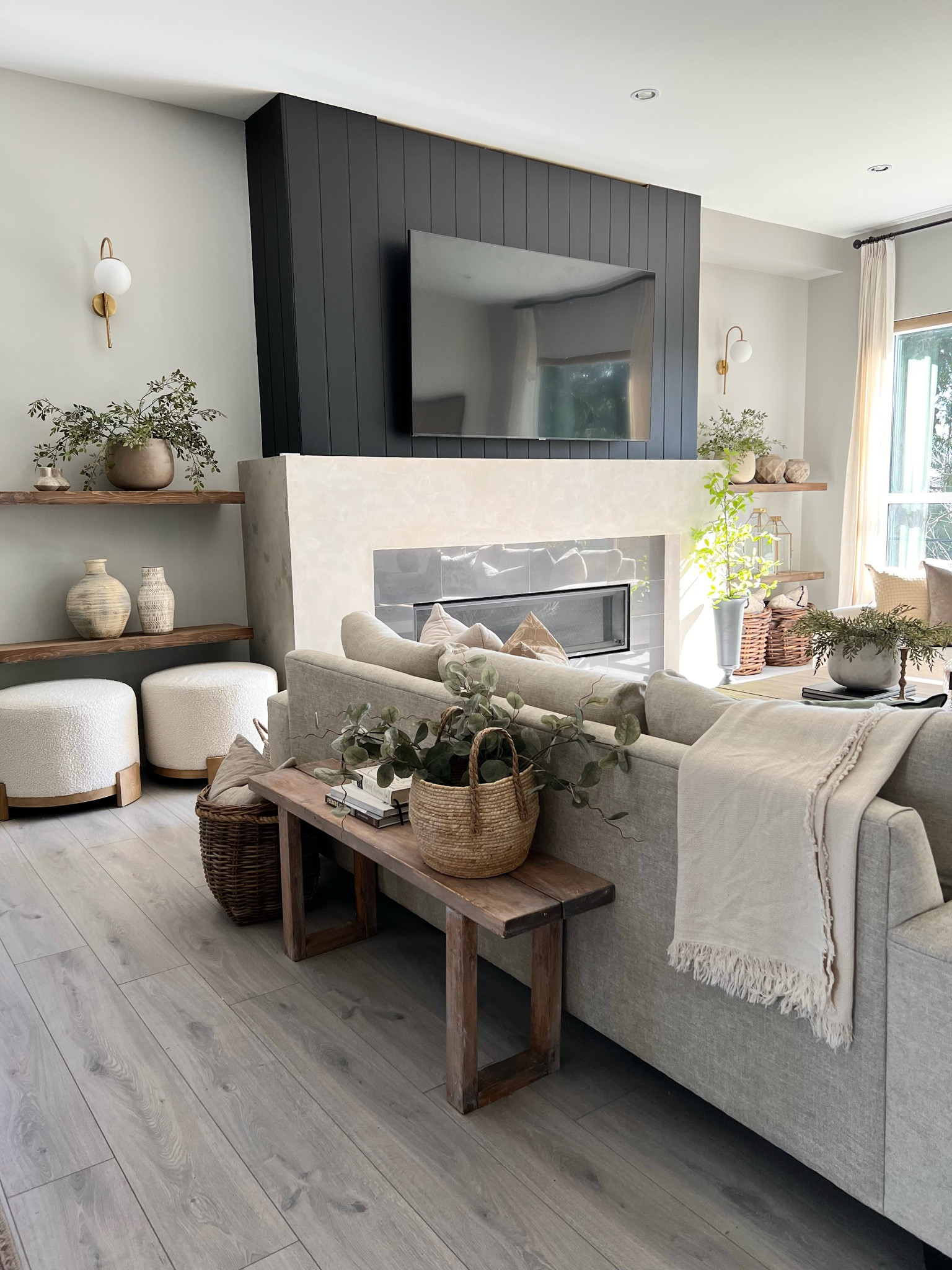 Current living room view..love the new wall sconces flanking the fireplace. 
Home decor inspiration 