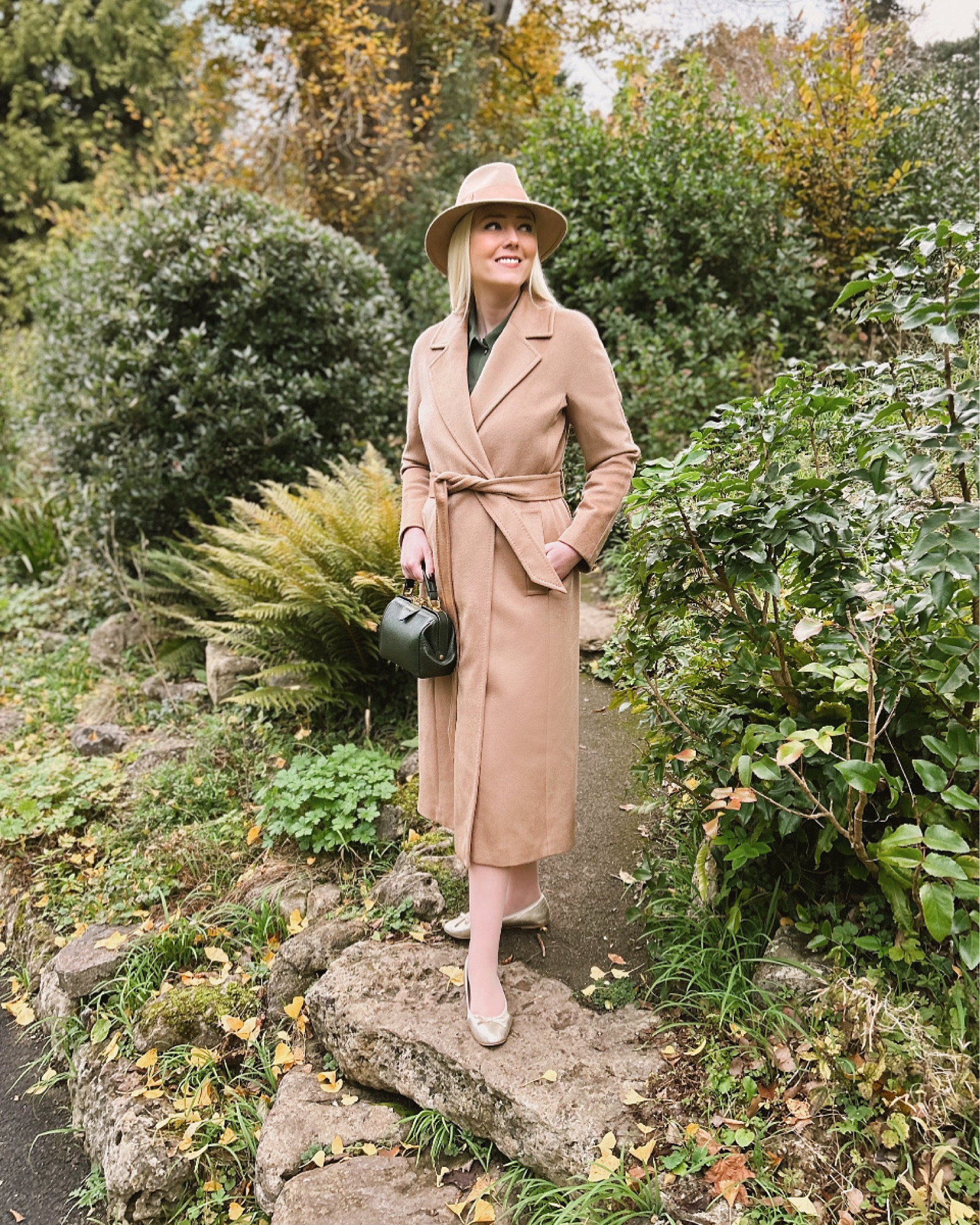Introducing my new Frances Camel Maxi Wool Coat from the LK Bennett Ascot Collection! There is something so comforting about a belted coat, especially when you’re wrapping yourself in beautiful soft wool like this. Don’t miss 25% off at LK Bennett London with code STYLELKB20 which ends tonight & add the gold ballet pumps to your basket! If you miss this offer use my LK Bennett 15% discount code REBECCALIPKINAUTHOR15

Styled with the khaki green Raquel dress by Sezane Paris, gold ballerinas, the Cambridge Satchel Co Mini Sophie bag in Ivy leather and a Camel Fedora!

#LTKautumn #LTKuk #LTKCyberWeek