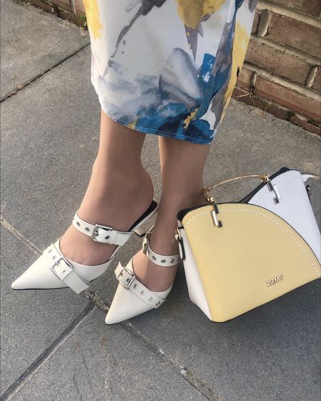 These double buckle, kitten-heel mules are so comfy, easy to slip into, and give an elegant vibe to summer dresses and outfits! They come in 5 different colors. I ordered the beige and loved them so much that I went back and ordered the denim, too! 


#LTKShoeCrush