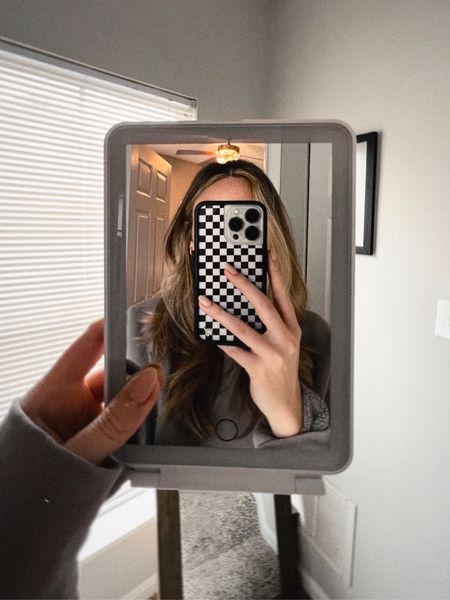Don’t risk hotel bathroom lighting. This travel mirror is perfectly compact and has three different light features. 

My new phone case is the star of this pic too 🤎

#LTKtravel #LTKunder50
