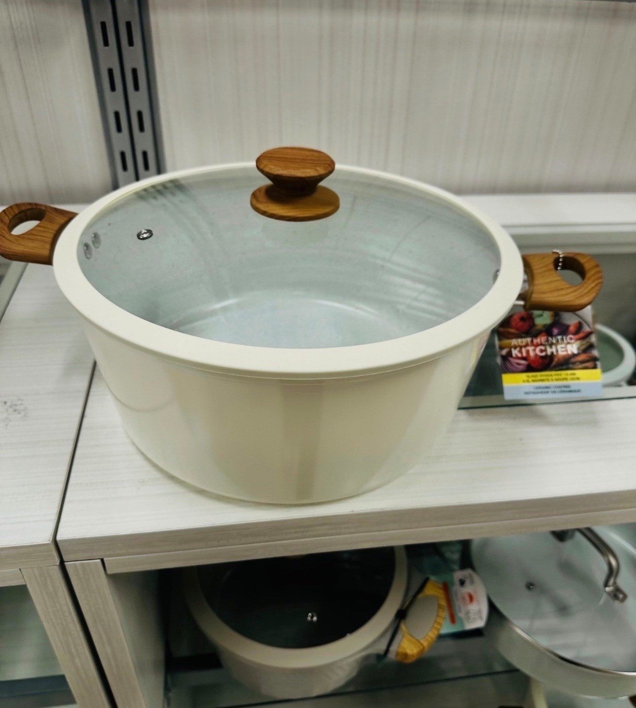 Elevated kitchen essentials on a budget. 👩‍🍳 This cream ceramic stock pot with the wood-effect handles is the perfect blend of functional and aesthetic. It looks so high-end sitting on the stove! Neutral lovers, this one is for you. #KitchenFinds #HomeDecor #NeutralAesthetic

#LTKSaleAlert #LTKHome