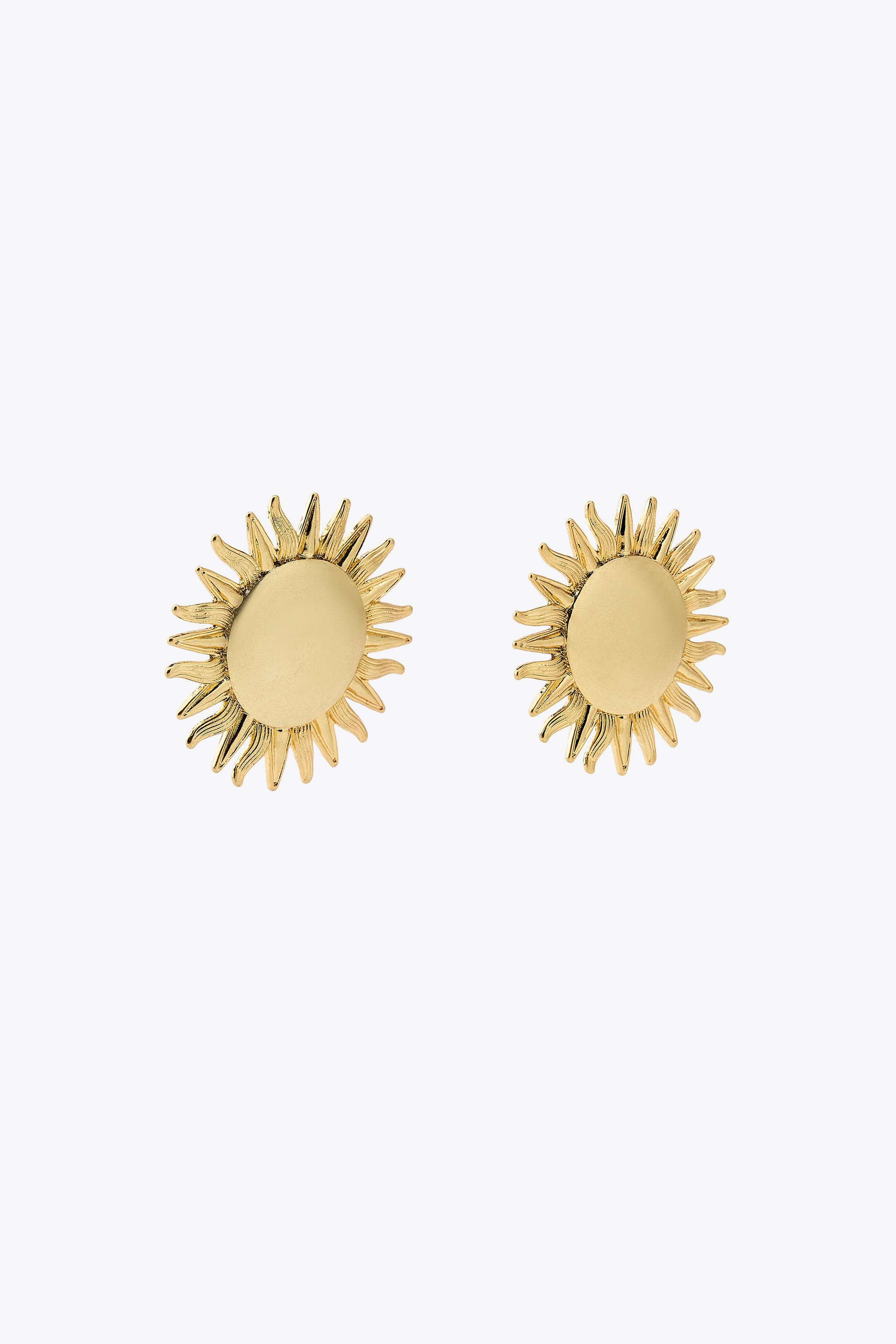 Maxi metal earrings with a raised sun design. Push-back and clip closure. | Zara UK