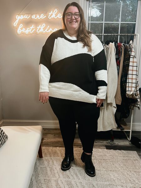 Plus size outfits I wore on a family girls trip to Highlands, NC! What I wore for a cozy game night in the cabin! Target sweater (size 4X), Torrid signature pocket leggings (size 5), Lane Bryant Dream Cloud boots (linked similar), Target necklace, and Warby Parker glasses. 

#LTKcurves #LTKstyletip #LTKSeasonal