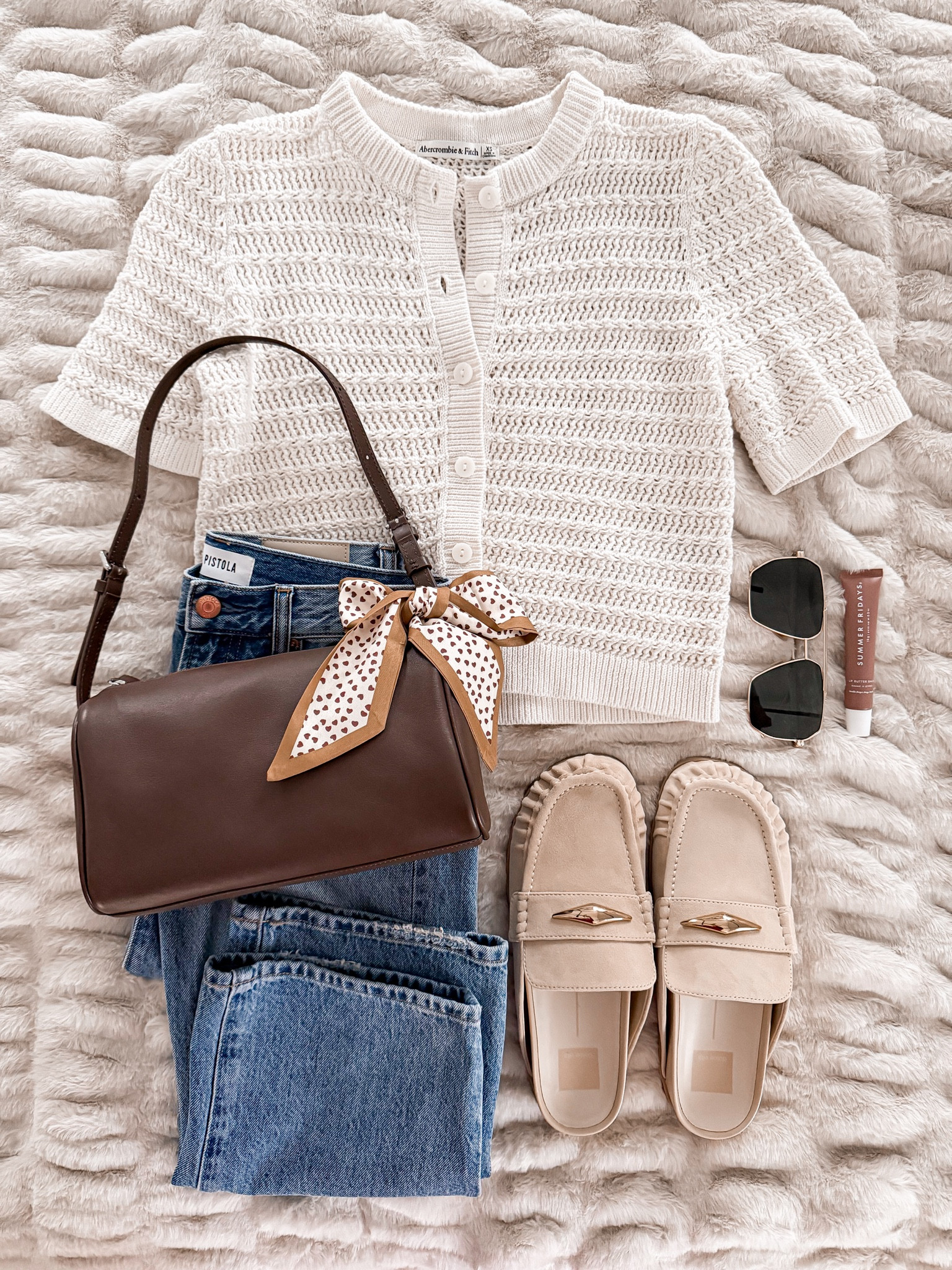 Neutral spring outfit. Favorite bowed jeans (size 24) and xs in this short sleeve cardigan 

#LTKmomlife #LTKootd #LTKOver40