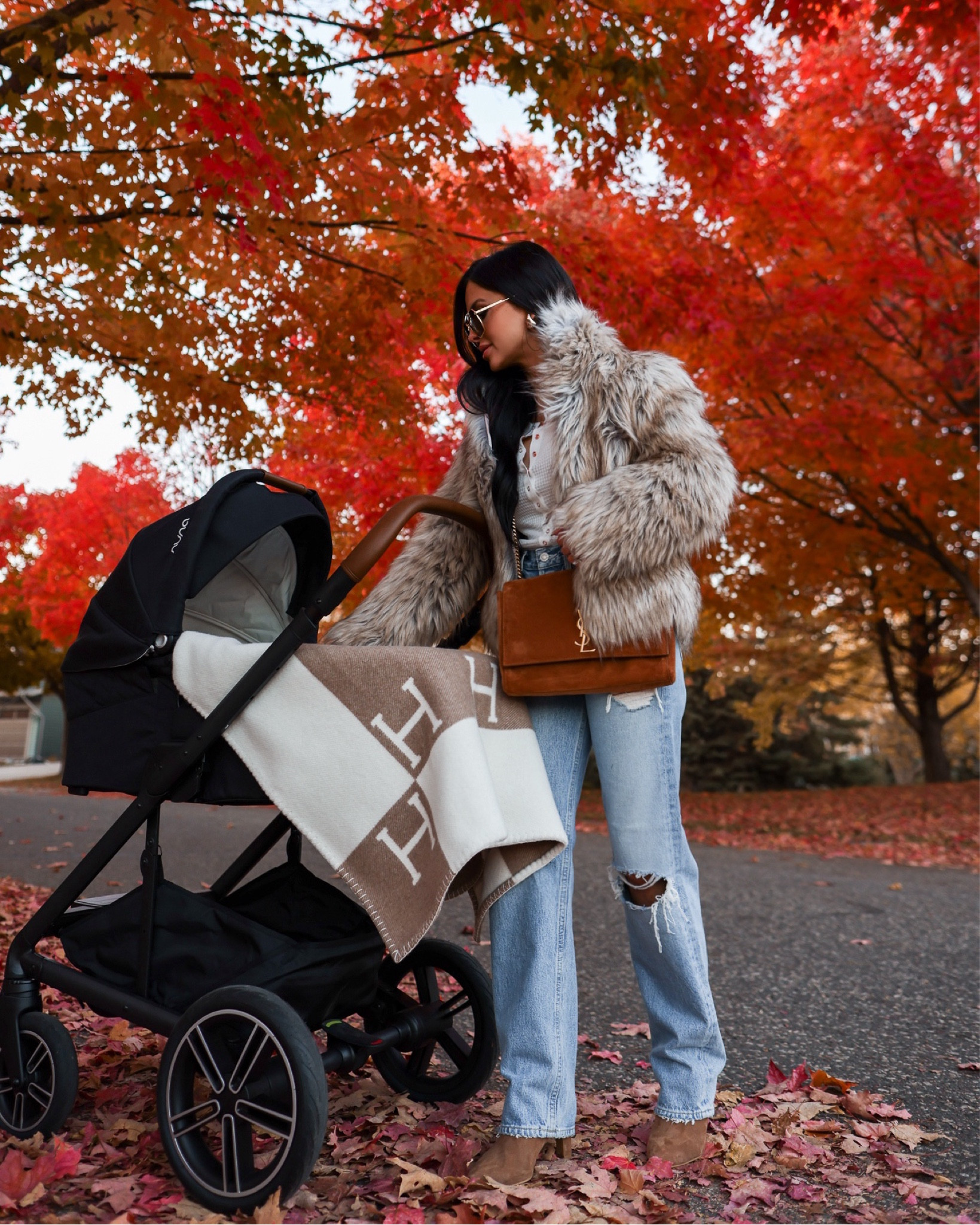 Fall outfit ideas 
Revolve Faux fur coat wearing an XS
Free People thermal top 
Agolde denim run TTS 
Nuna stroller 
Saint Laurent Kate bag 


#LTKSeasonal #LTKStyleTip #LTKFindsUnder100