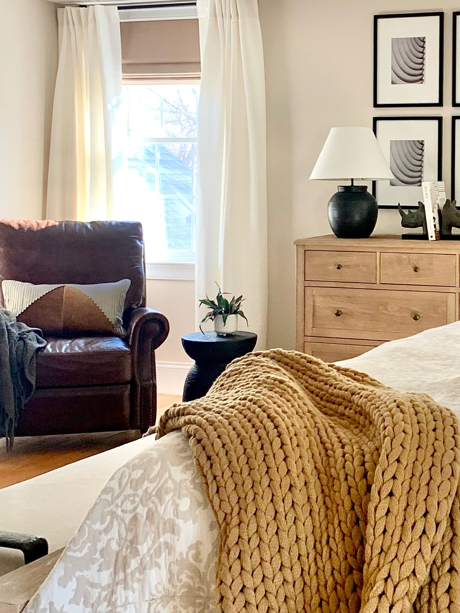 Bedroom decor
Recliner chair, throw, table lamp, side table, gallery wall frames 

#LTKFind #LTKstyletip #LTKhome