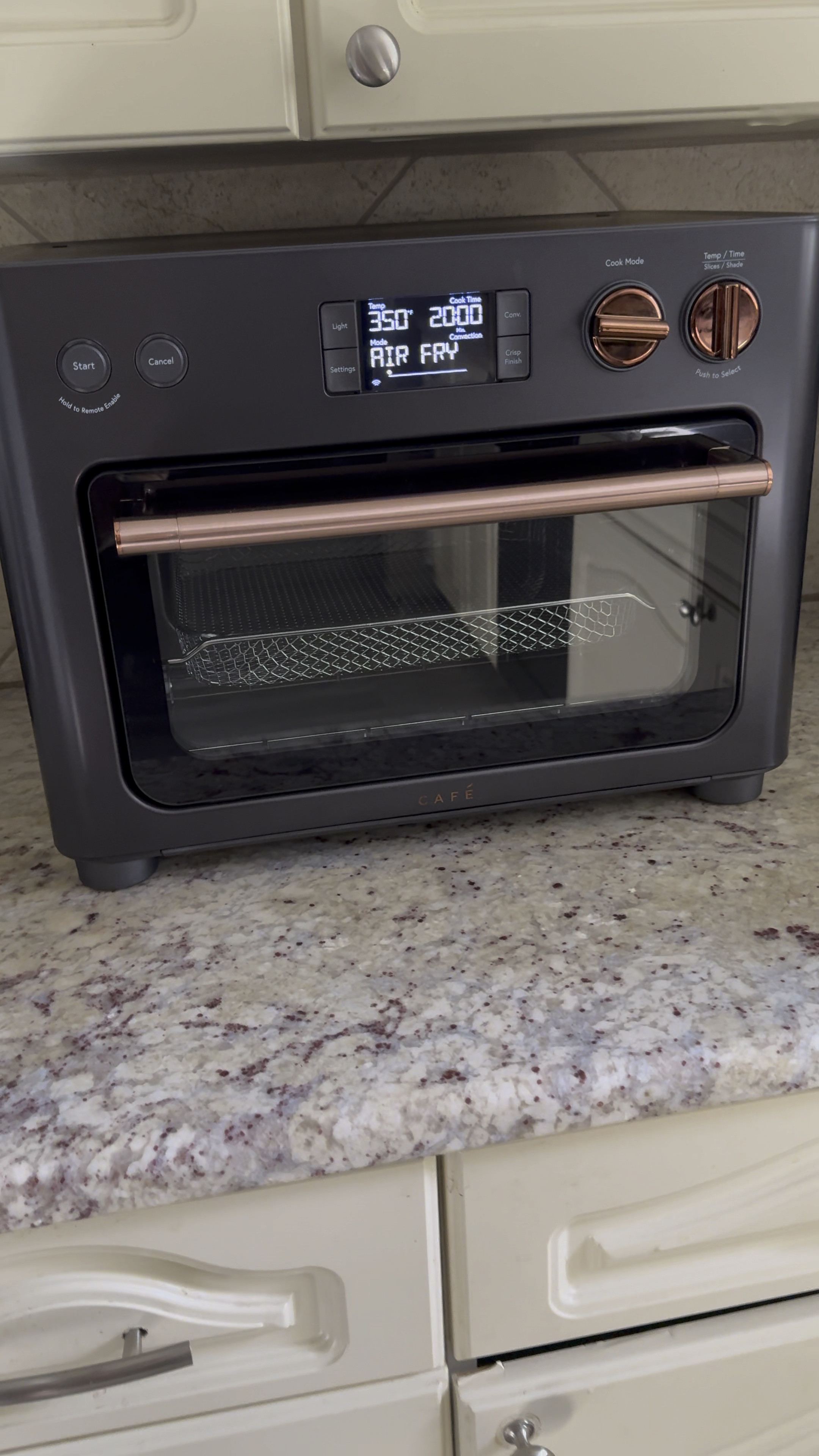 Combo toaster oven/air fryer! Comes with 14 cooking modes and a large temperature range that allow you to proof dough, dehydrate fruit and slow cook at low temps as well as bake pizza, roast vegetables and air fry appetizers at high heat. The rapidly heating appliance also serves as a toaster with dedicated bagel and toast functions. To give everything you make the perfectly browned and crispy finishing touch, use the Crisp Finish option. Control the WiFi-connected smart appliance remotely with the SmartHQ app or by voice using your home device. 

#LTKhome #LTKVideo #LTKsalealert