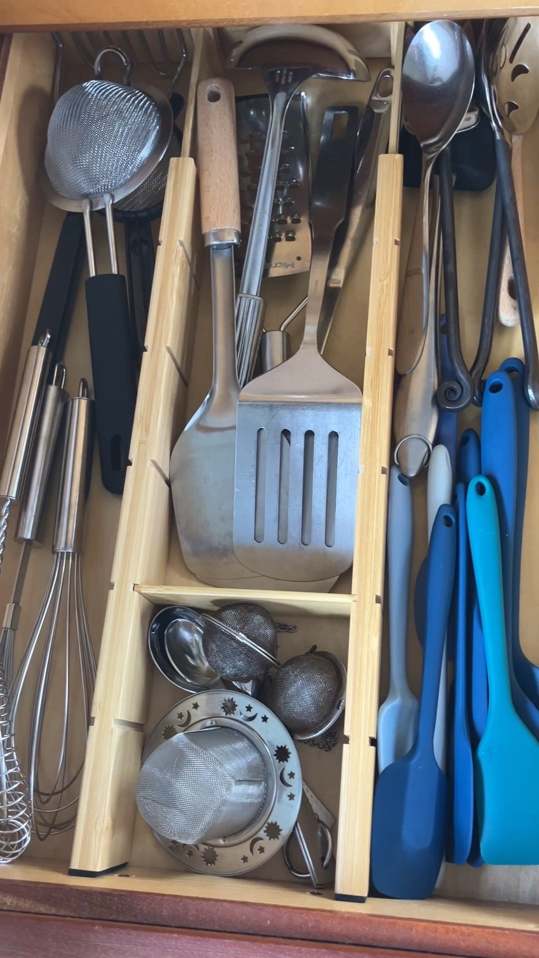 A simple solution for messy utensil drawers. This adjustable bamboo organizer helps create sections for everyday kitchen tools, so everything has a place instead of ending up in one big pile.

#LTKHome #LTKmomlife #LTKOver40