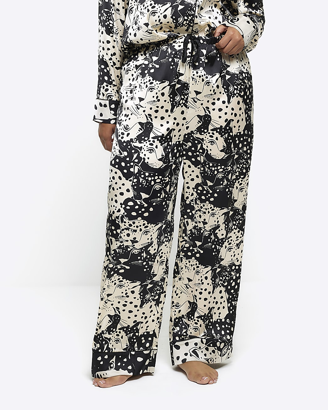 Plus black satin animal print pyjama bottoms | River Island (US)