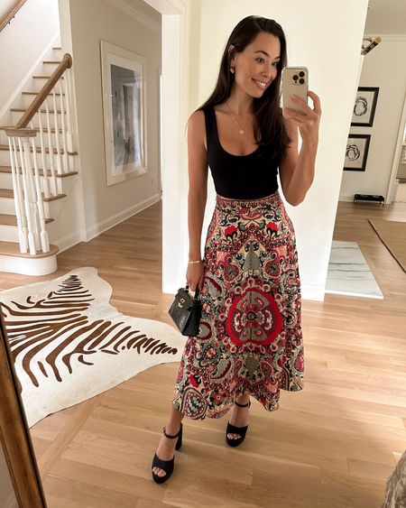 Kat Jamieson shares an elegant fall outfit. Holiday outfit, colorful printed skirt, florals, bodysuit, platform sandals, mini bag. Heels are Chanel, similar below.

#LTKSeasonal #LTKshoecrush #LTKHoliday