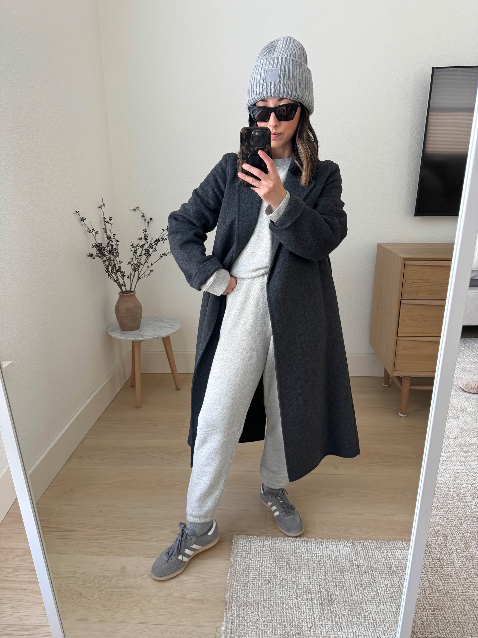 These Jenni Kayne sweat sets have been a winter wardrobe staple of mine for 4+ years. Elevated and petite-friendly sweats to leave the house in. Pricey, but quality is amazing.

Mango coat xxs (color and style is old, current version is long and more tts)
Jenni Kayne sweatshirt medium Color: Light Grey
Jenni Kayne sweatpants xs Color: Light Grey
Adidas Samba 4.5 mens
Varely beanie
YSL sunglasses

Petite style, fall outfits, athleisure, fall style 

#LTKootd #LTKPetite #LTKSeasonal