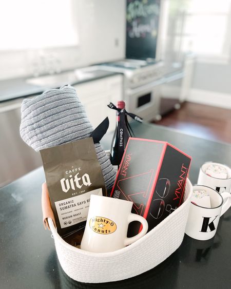 I loved curated this more masculine closing basket for a client. I added 2 coffee cups featuring initials for his college-aged daughters so they always had a cup for morning conversations around the breakfast table or sipping hot cocoa during the holidays. 

#closingbasket #hostgift #hostessgift