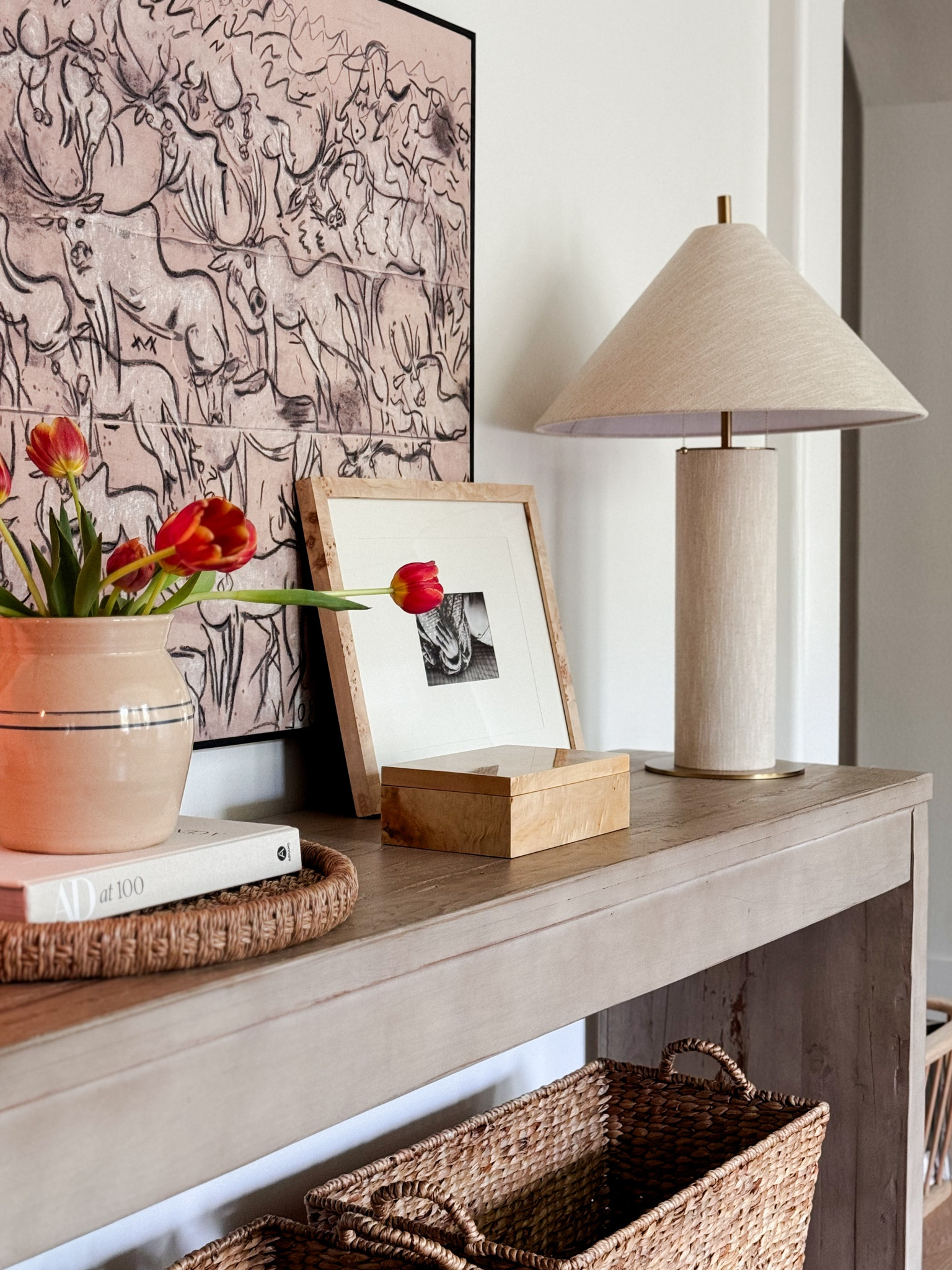 A modern organic console table designed with a blend of seagrass, burlwood and linen elements! 

Crate and Barrel Lamp, Linen Lamp, Console Table Styling, Console Table Design, Gallery Wall, Gallery Frame, Tray, Seagrass Tray, Rattan Tray, Coffee Table Book, AD at 100, Tulips, Faux Stems, Faux Tulips, Kader Boly, Migration, Abstract Art, Basket

#LTKFindsUnder100 #LTKHome #LTKFindsUnder50