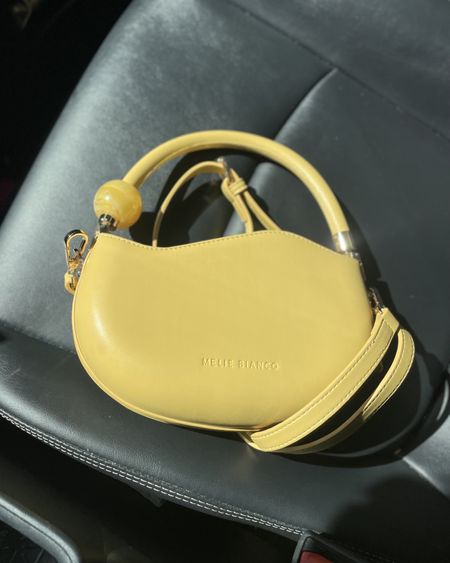 How cute is this bag!? It’s a unique piece of art. 
▫️It’s Vegan leather is buttery soft
▫️It’s shape is so unique 
▫️This soft yellow color is perfect for spring/summer. 

#LTKitbag