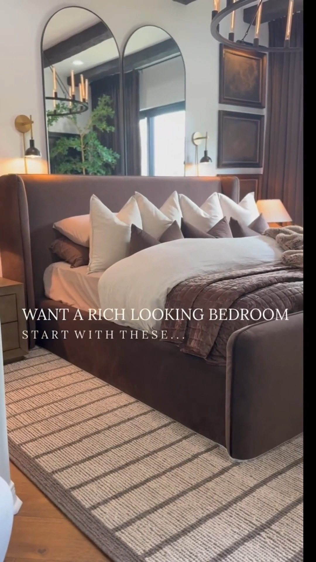 Want to recreate my iconic bedroom? Start with these finds first! ☝️

Solid Wood Nightstands 
Platform Bed Frame
Velvet Curtains
Picture Lights
Sconces
Bedding and Stunning Throw 
Rustic Pot
Faux Tree & Rug
Oversized Chandelier & Arched Mirrors

#interiordesign #bedroominspo #moodybedroomdesign #moodybedroom #aestheticbedroom #amazonfinds #interiordecor #bedroomdesign #moodybrowns #neutraldecor

#LTKFindsUnder100 #LTKHome #LTKStyleTip