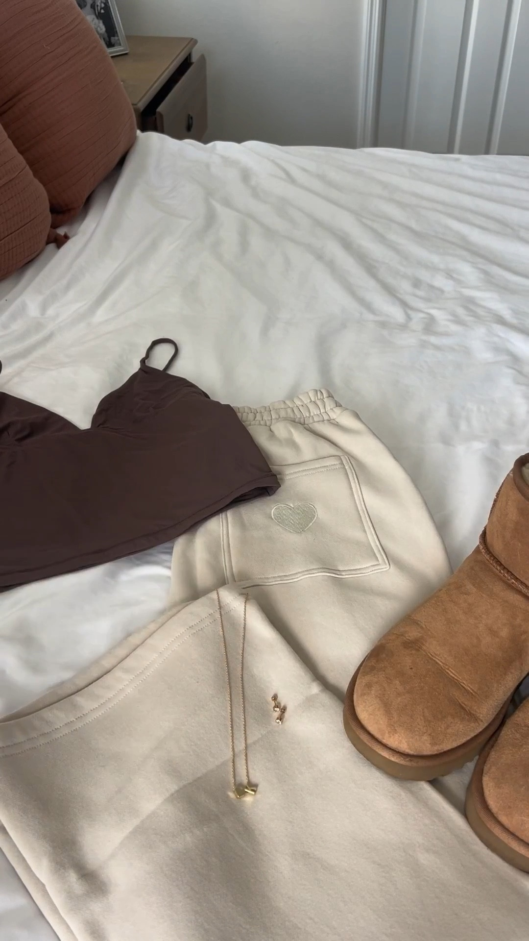 Chocolate and cream will always have my heart 🤎☁️

A soft brown skims dupe with cozy cream sweats, styled with chestnut mini Uggs, and classic gold jewelry to pull it all together. The kind of easy athleisure look that feels just as good running errands or grabbing coffee as it does lounging at home 🫶🏼

Comfy, neutral, and effortlessly put together. The pieces you reach for on repeat 💅🏻

#athleisurestyle #neutraloutfit #cozyathleisure #everydayoutfit #comfyandcute #neutralstyleinspo #uggstyle #effortlessstyle #casualoutfitideas #errandoutfit #cozygirlvibes #athleisurevibes

#LTKU #LTKootd #LTKSeasonal