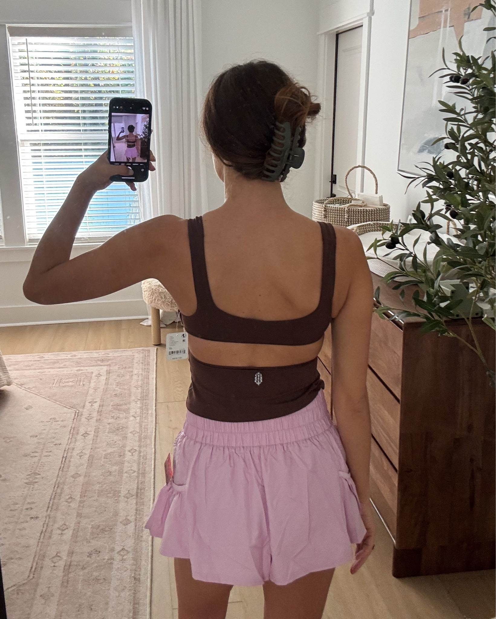 Love this full length workout tank + flowy activewear shorts!! the brown and pink colors are so cute together:)) wearing size S 

workout outfit, workout clothes, running shorts, running tank, open back, unique workout wear, fpmovement 

#LTKfitnessgoals #LTKActive #LTKGiftGuide