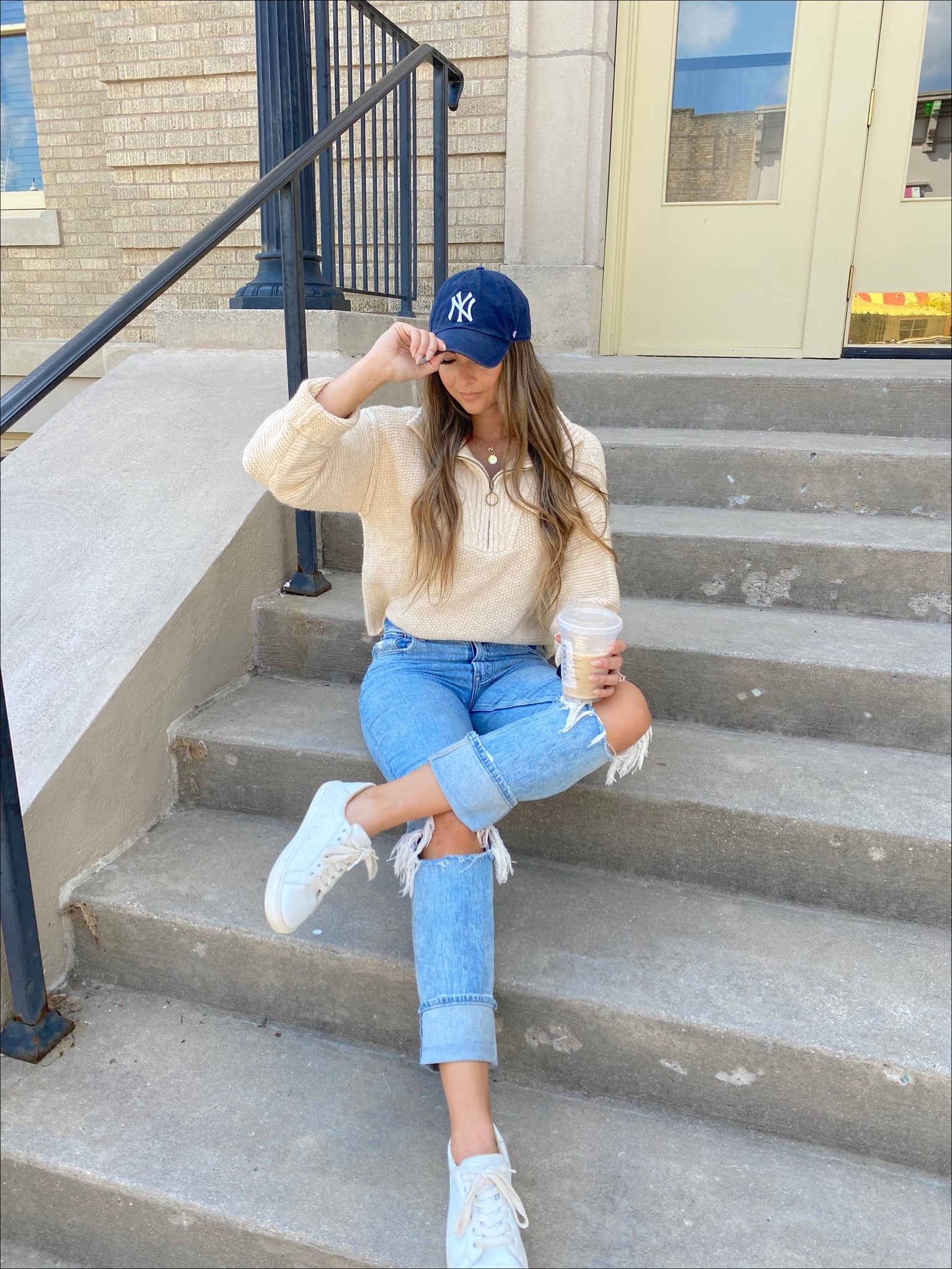 True to size! 

Quarter zip sweater, target fashion, baseball cap, boyfriend jeans, white sneakers 