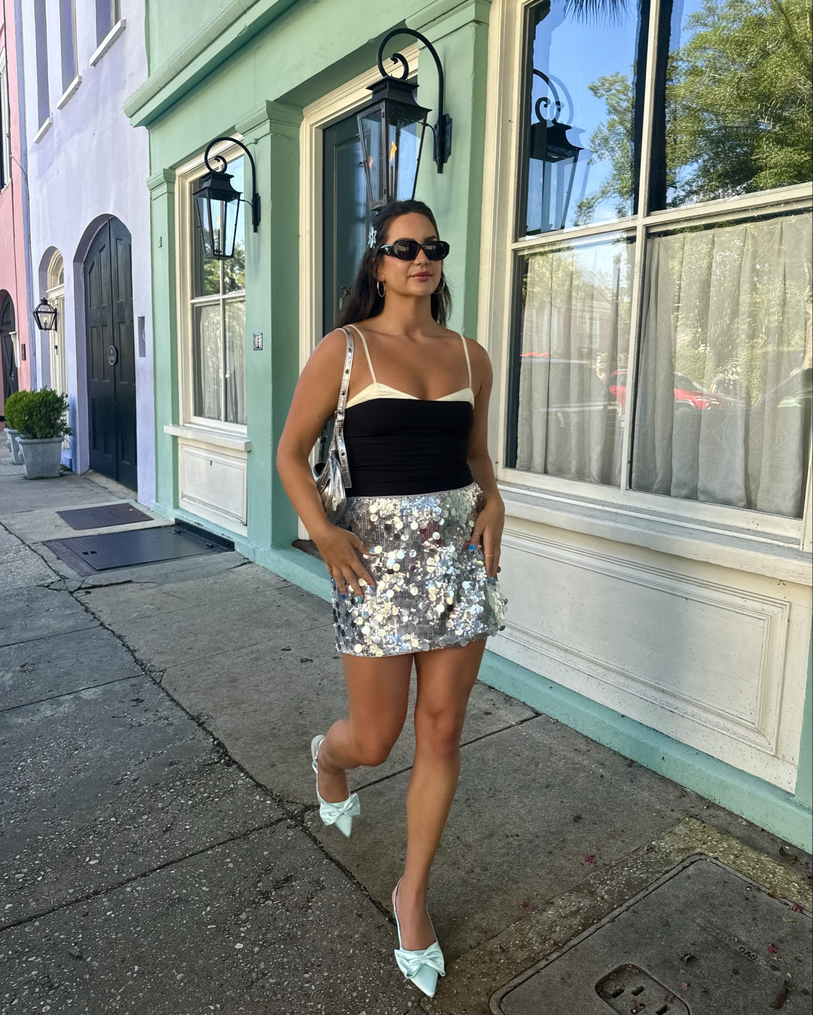 Loved this chic but fun little birthday fit I threw together for a Charleston GNO! 🪩🕺 

Disco skirt, Y2K, Amazon finds, silver, Prada sunglasses, metallic purse 

#LTKStyleTip #LTKU #LTKTravel