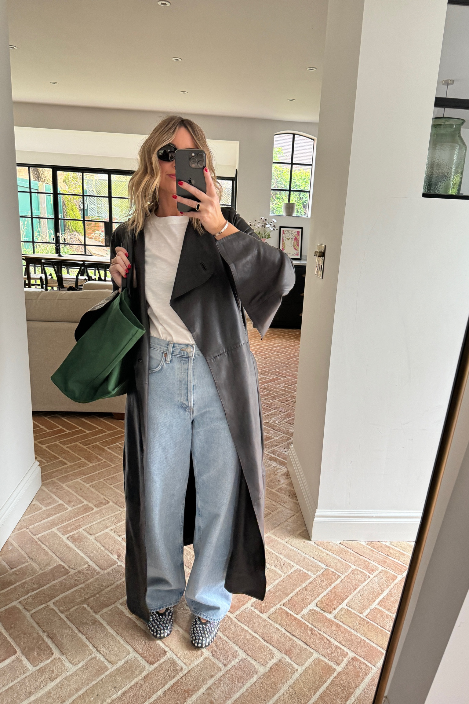 Agolde Baggy Jeans | Long Leather Jacket | Green The Idaho Bag | Alaia Crystal Ballet Flats | White T Shirt 

#LTKstyletip #LTKfindsunder100 #LTKeurope