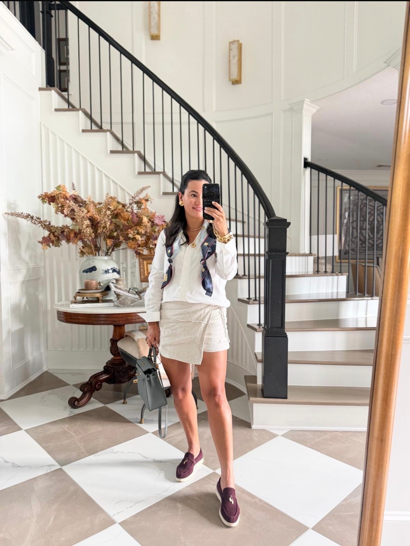 A crisp white blouse paired with neutral shorts, burgundy loafers, a silk scarf, and a structured handbag—the perfect mix of classic and chic.

Follow me @miriamobrien on IG and TikTok

#OOTD #Fashion #Fall #Season

#LTKootd #LTKmomlife #LTKOver40