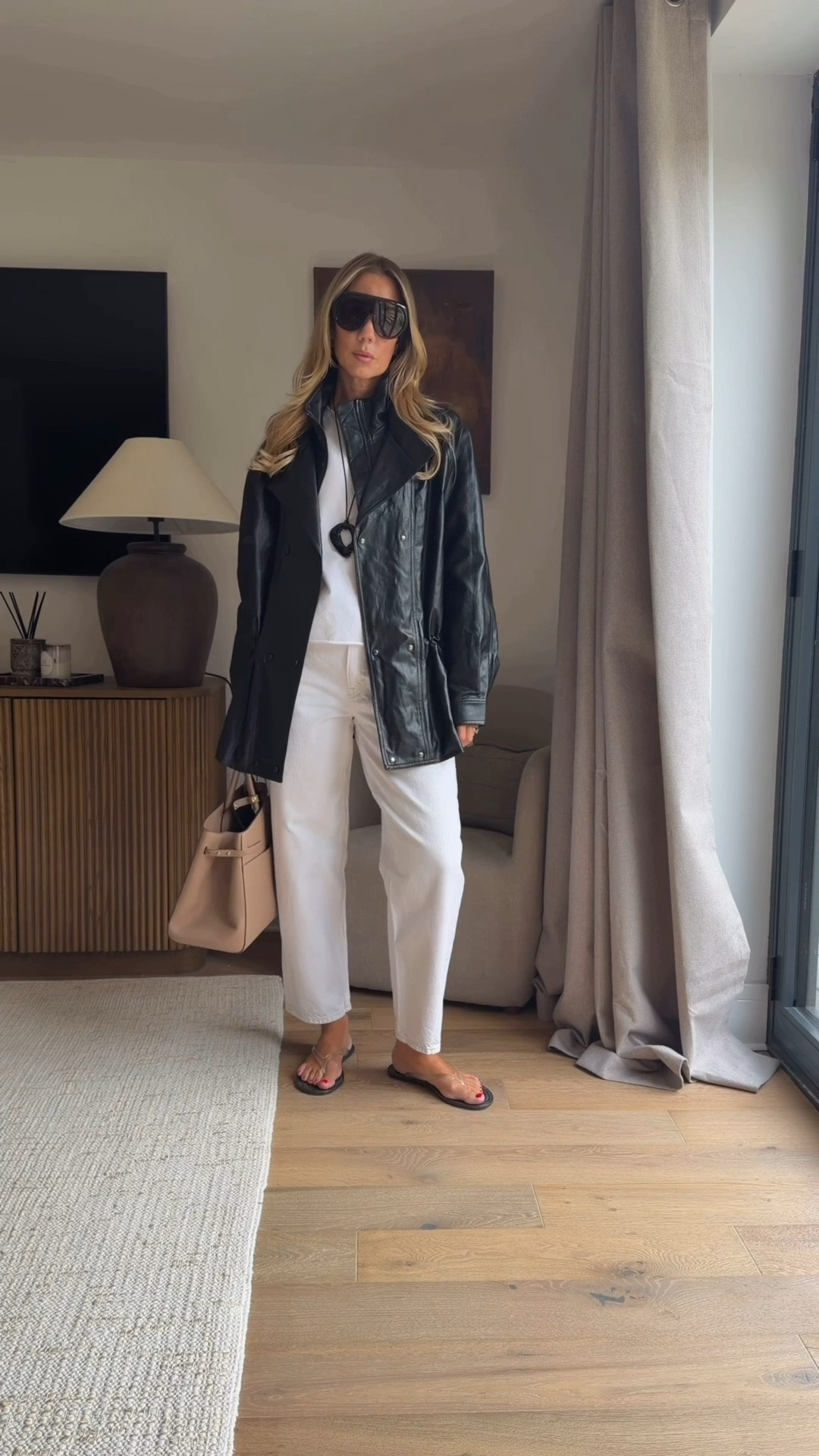 I always say it’s not necessarily where you shop, but how you style it and this is such a good example. I loved the shape immediately: the oversized collar, relaxed fit and drawstring waist mean you can completely change the silhouette.

I’ve kept it simple here with white denim, a black base and a structured bag, but come autumn I’ll be styling it with straight-leg blue denim + loafers, tailored trousers + a slim knit, or over a satin skirt with boots.

Styling tip: if a jacket is oversized, play with proportion. Cinch the waist, keep your base layer fitted or add something structured like a bag to make the whole outfit feel intentional.

#LTKuk #LTKautumn #LTKFashionMonth