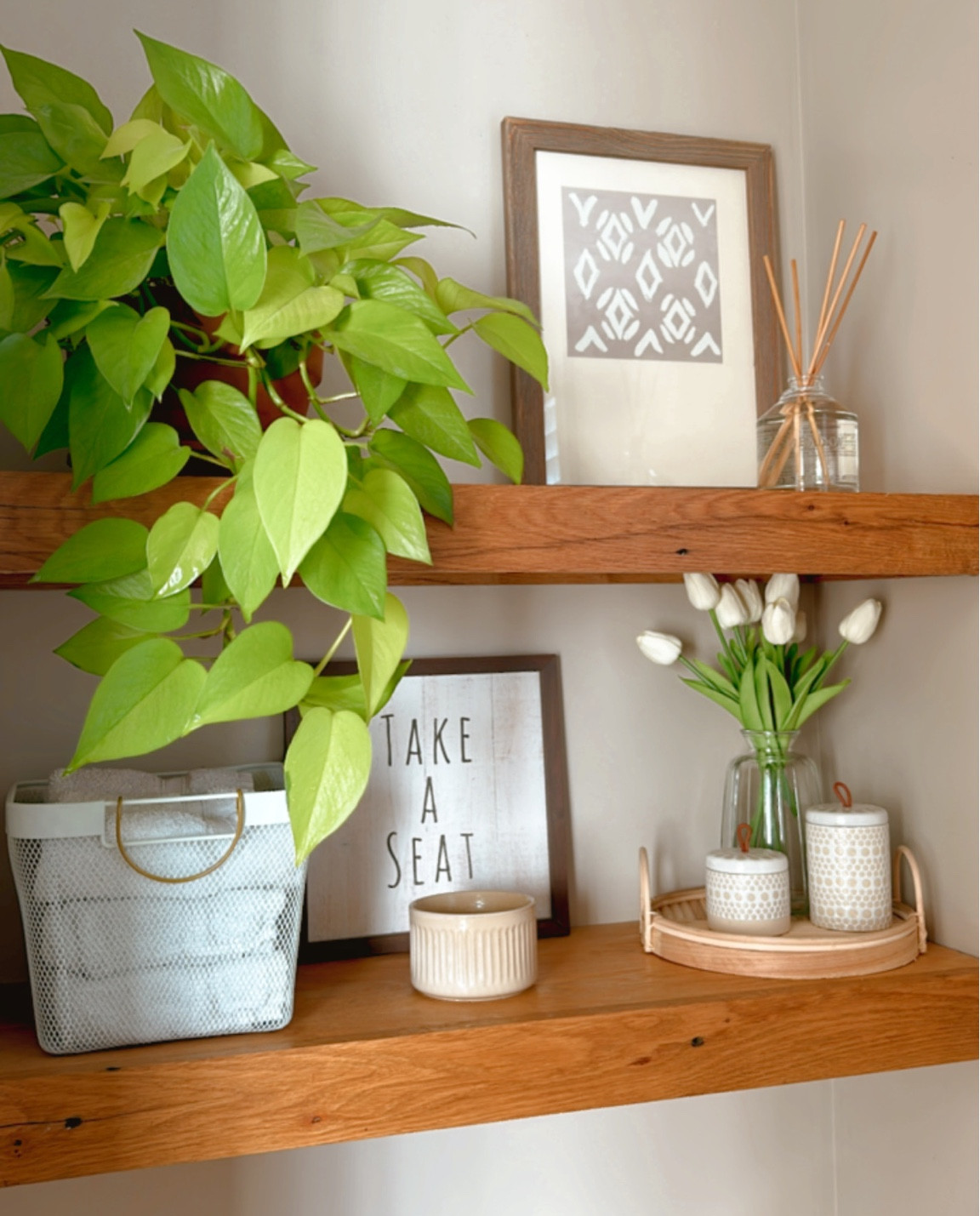 Bathroom shelves. Faux tulips, hearth and hand oil diffuser .

#LTKhome