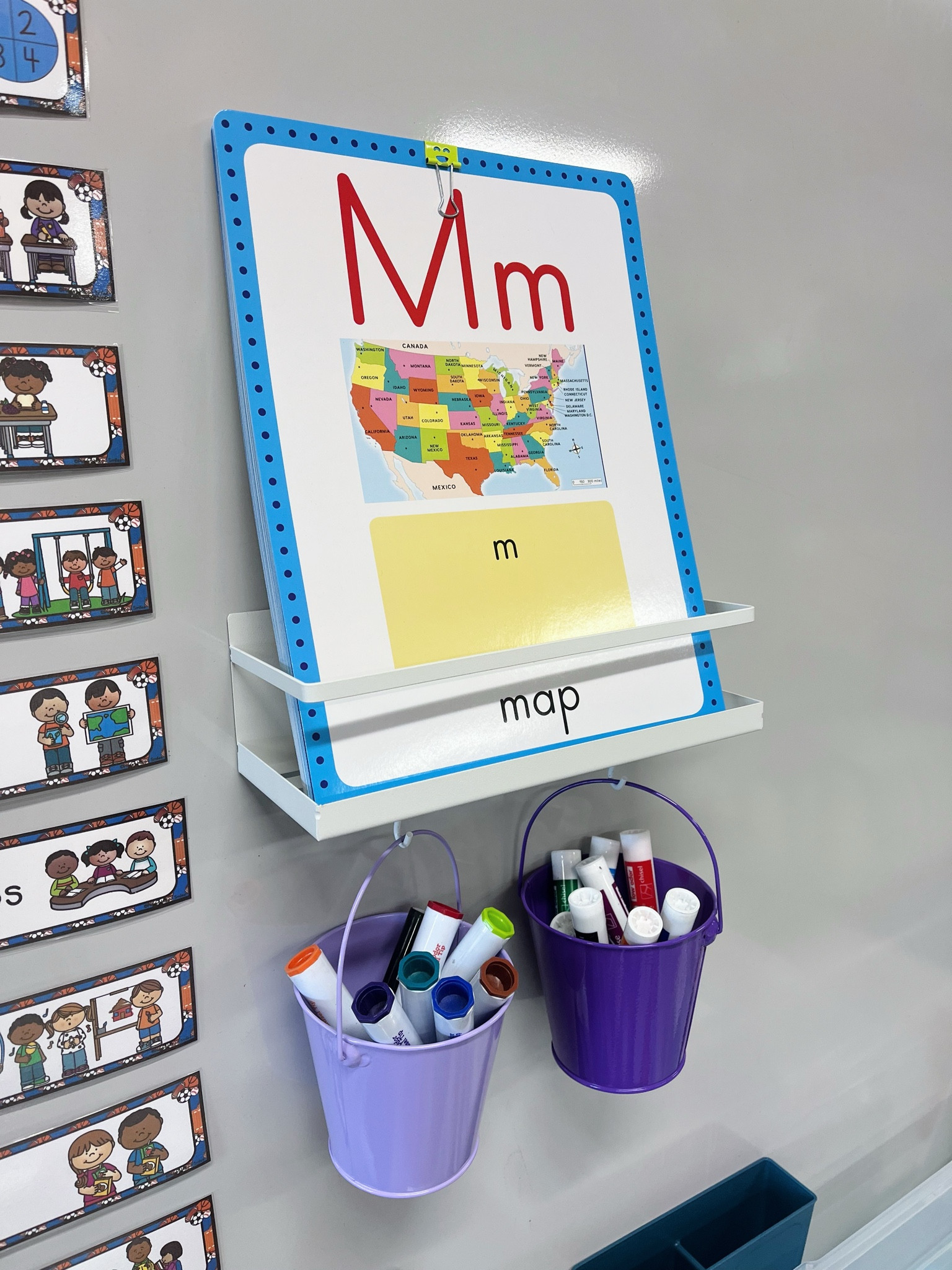 These shelves + buckets are too cute for additional storage on my white board!! 