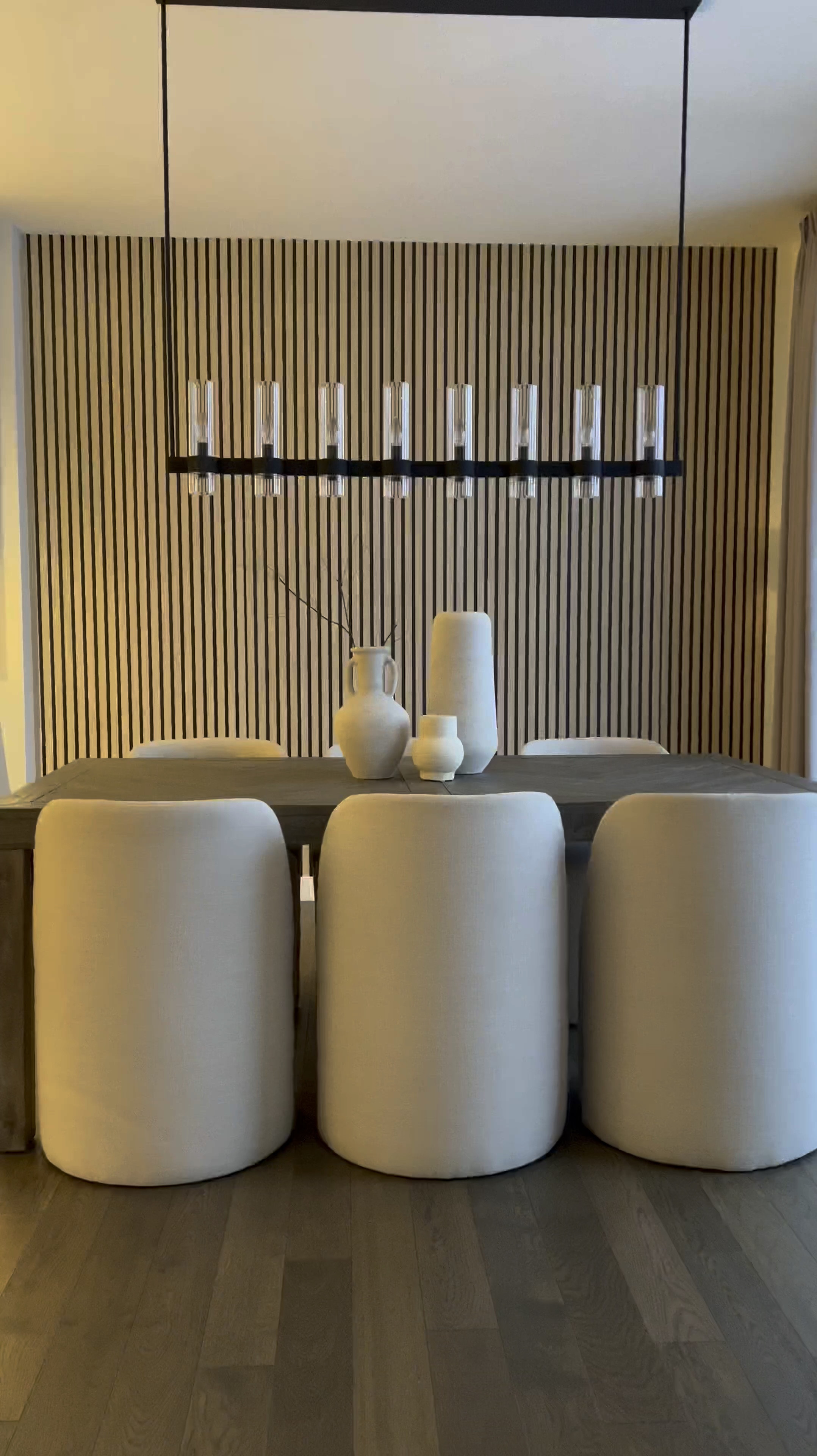 (I used color Wood A)

 Hey friend! ☺️

So here’s a simple way to upgrade your wall and get the wooden slat look with wallpaper! 🎉

Tips: 
Wallpaper is peel and stick so to remove, use a blow dryer so you don’t mess up your paint or drywall ☺️ I used 3 rolls. My wall is 9ft by 10.5ft 

This is by far the simplest wallpaper I’ve installed. The design is forgiving, so even if you overlap a bit more than you’d like, it isn’t noticeable… making install even simpler. 

I added plug in 16 ft LED light strips to the back of the mirror. Color is warm white or 3000K. 🔌 My mirror is 83inches in height by 48 inches. 🪞 

The sconces are my favorite addition to this wall! They are rechargeable. 🎉 They attach to the wall in two ways - They come with screws & a peel and stick adhesive….. which attaches to a magnetic metal piece which makes the sconce removable without having to reinstall it. 💕

I’ve linked the rest of the items below! ☺️
#LTKVideo 

#LTKStyleTip #LTKHome