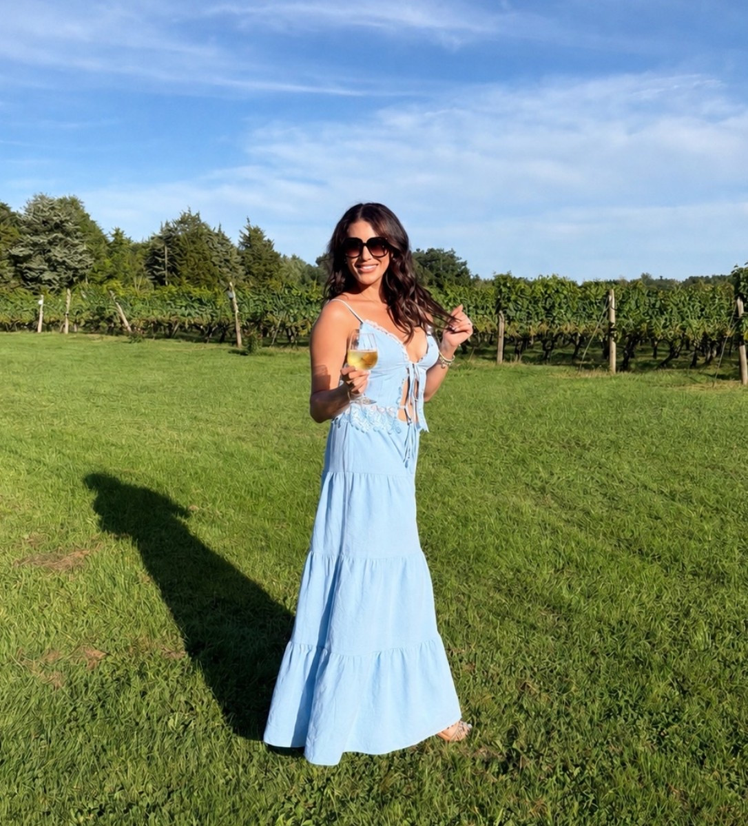 Cheers to the perfect vineyard day! 🍷✨ 

Loving this light blue tiered maxi skirt set for late summer wine tastings and weekend outings. The delicate lace trim and front tie detail give it such an effortless, coastal chic vibe.

#vineyardoutfit #maxidress #coastalchic #summerstyle #winerywear