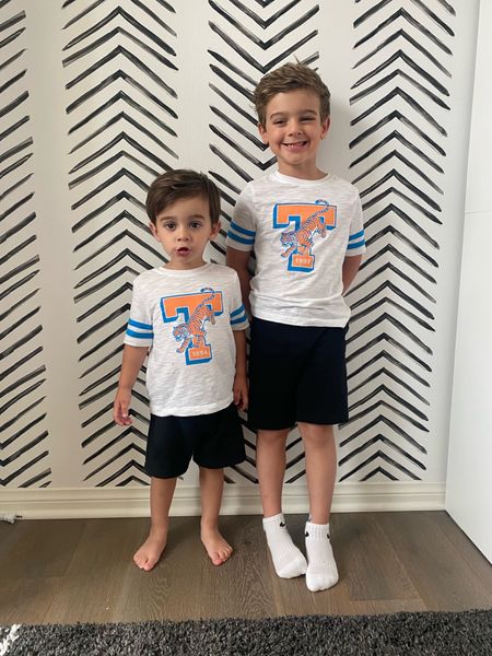 These boys of mine 😍😍 Loving these cute little varsity tees from Old Navy! Wearing a 2T and 5T

Old Navy, kids clothing, toddler boy outfits, preschool boy outfits, boys summer outfits, boys spring outfits, graphic tees for kids, everyday outfits for boys 

#LTKFindsUnder50 #LTKKids #LTKFamily