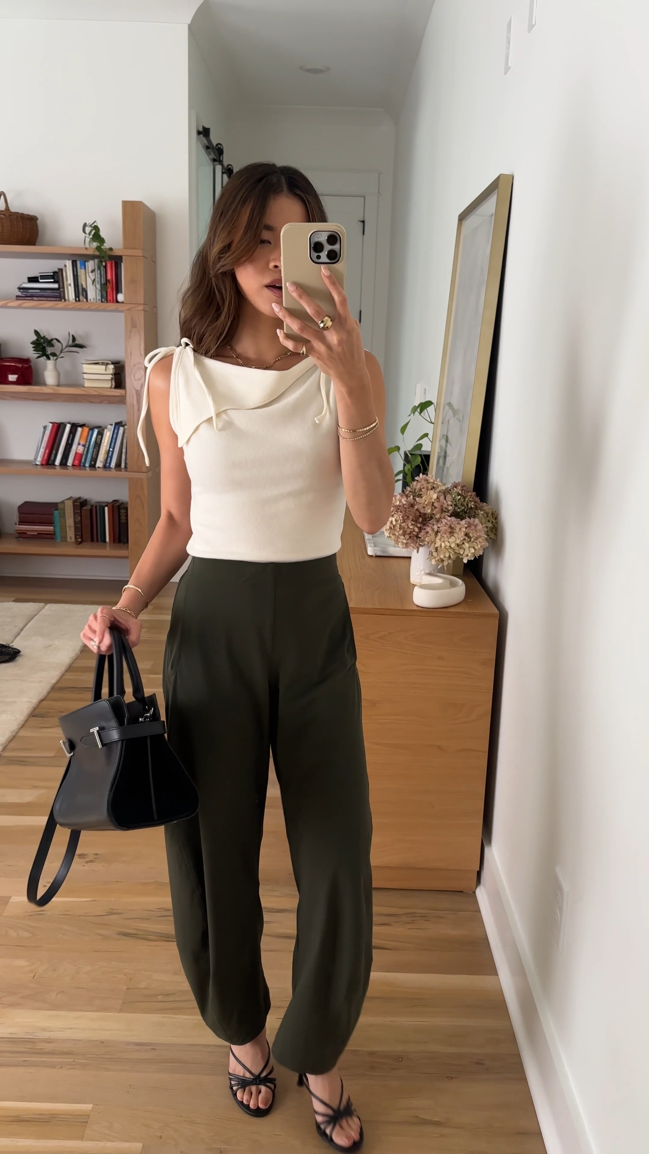 This top from @Reformation is everything. It dresses up my favorite pants from @Ruti.

Sizing info: 
-Ruti The On The Loose Work Pants (Size 0 regular in Verdant) 
-Reformation Emma Knit Top (XS in Fior Di Latte)

green pants, petite pants, green petite pants, fall pants, summer pants, barrel pants, summer outfit, fall outfit, vacation outfit, travel outfit, best petite pants, petite barrel pants, comfy pants, viral barrel pants, fall style, petite fall style, fall top, heels, black heels

#LTKootd #LTKSeasonal #LTKPetite