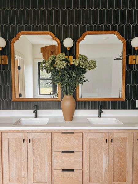 Bathroom statement floral.

Floral + Natural Vase.
Lighting and Mirrors linked too! 

Organic Modern Home / Scandinavian Vibes 

#LTKFind #LTKhome